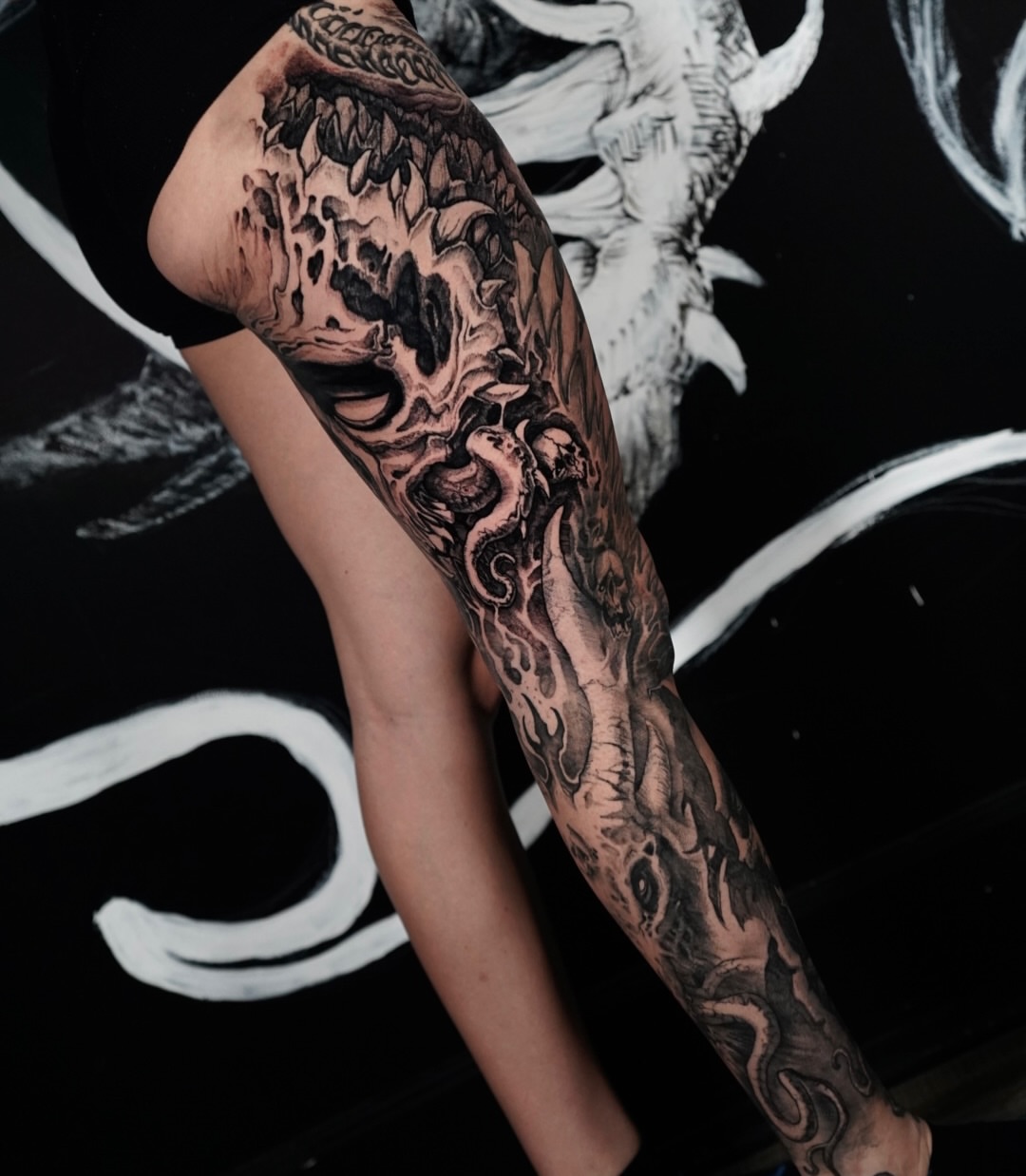 Serpent dark realism tattoo on the forearm by Jamie