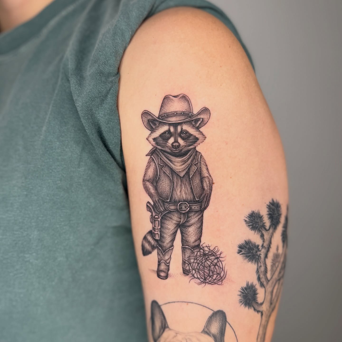 Raccoon cowboy realism tattoo on the forearm by Rose