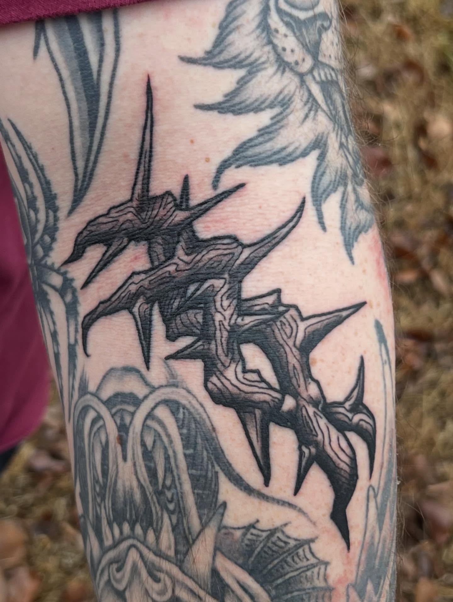 Dragon black and grey tattoo on the forearm by Lord Daniel Serna
