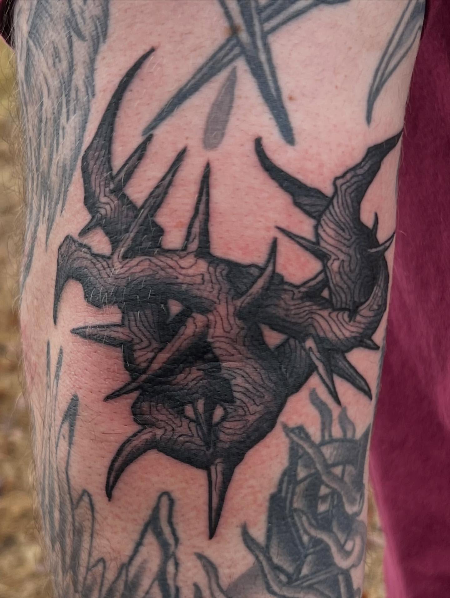 Crow geometric tattoo on the forearm by Lord Daniel Serna