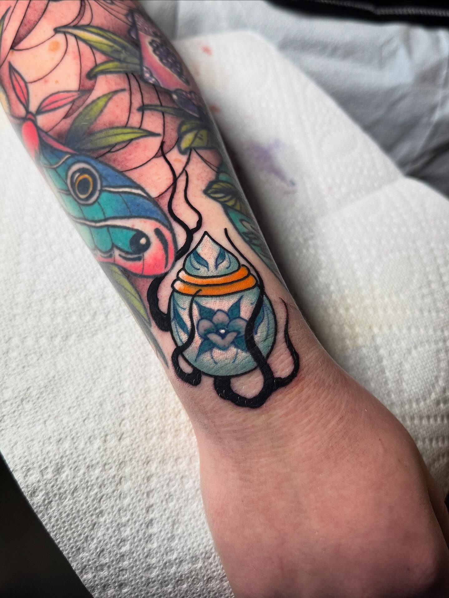Lantern American traditional tattoo on the forearm by Jess Longfield, Des Moines, Iowa