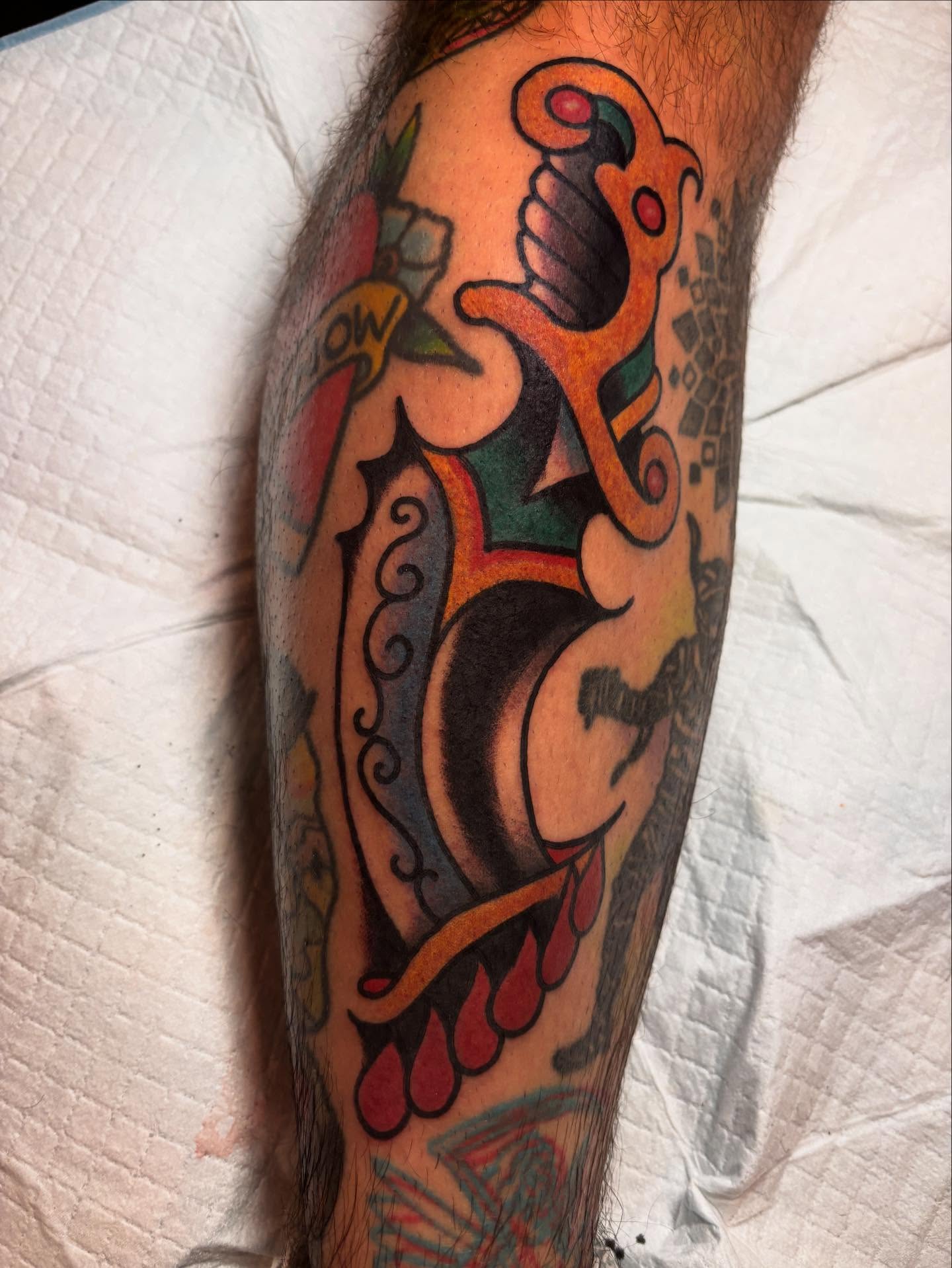 Mask American traditional tattoo on the forearm by ๐๐ซ๐ข๐ ๐๐ฅ๐ญ๐จ๐ง๐๐ง