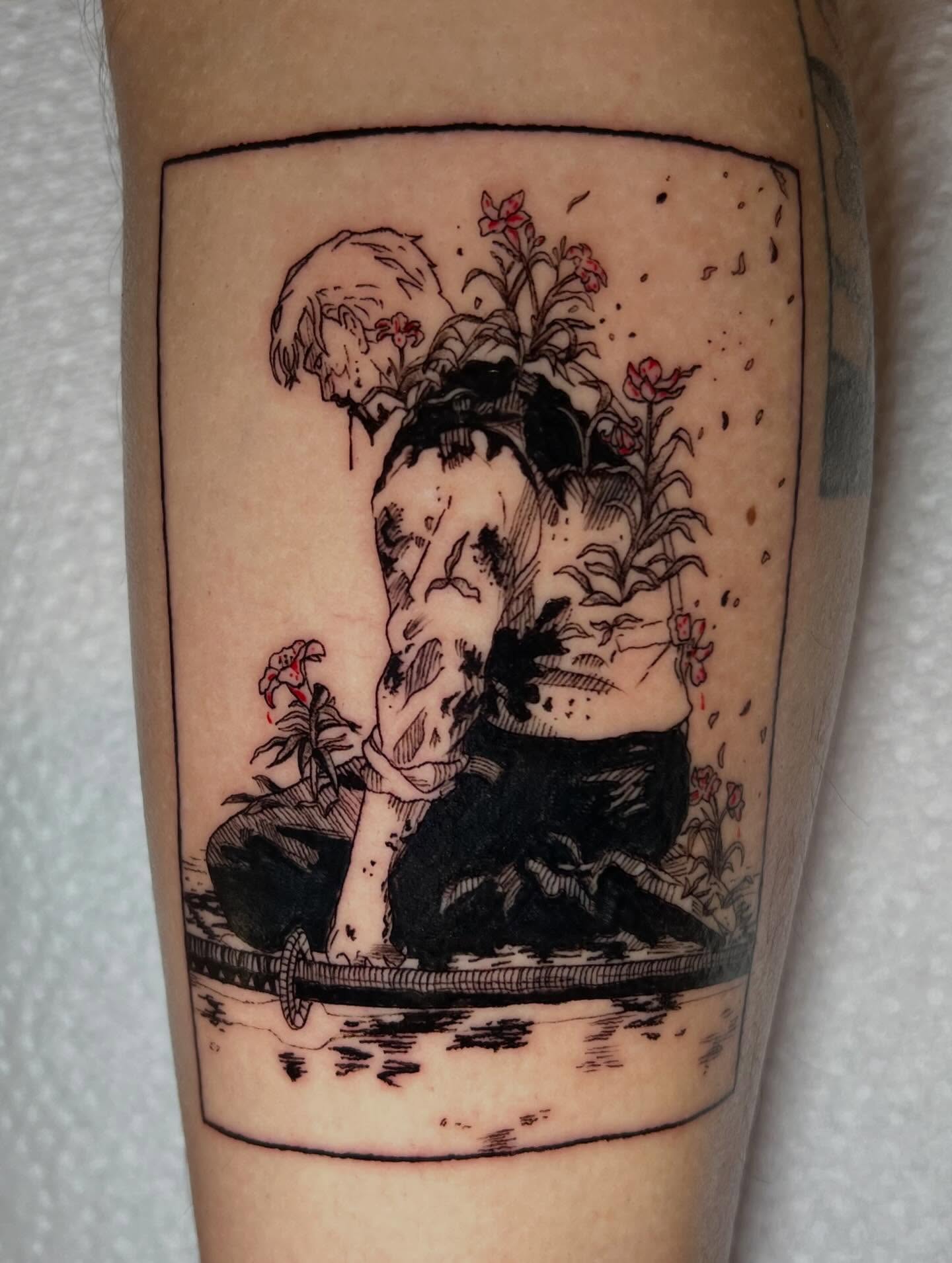 Child and flowers black and grey tattoo on the forearm by Juliet Miller