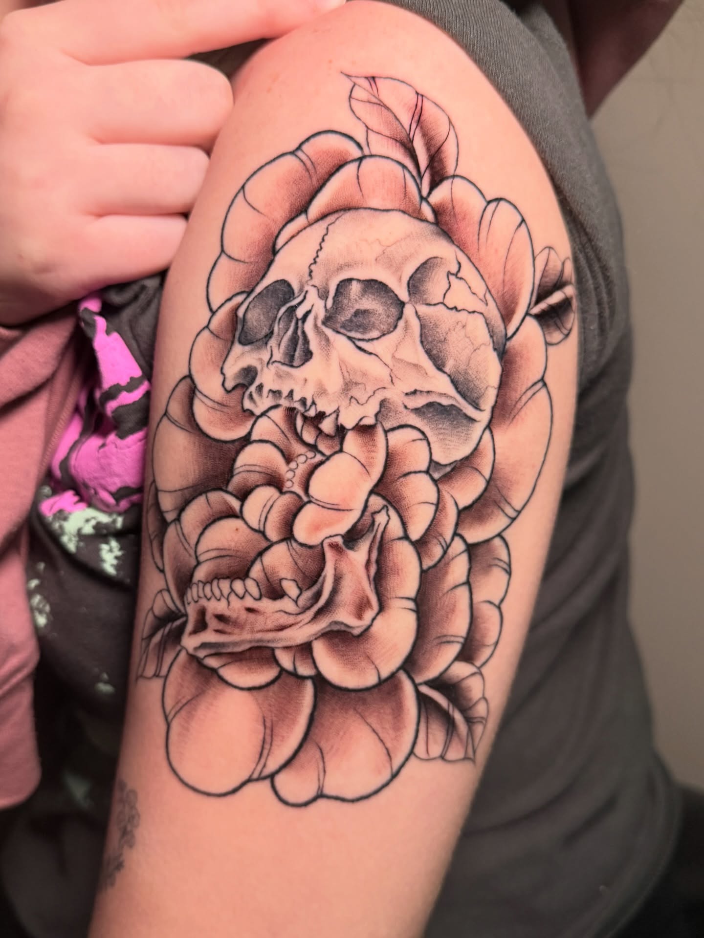 Skull and rose realism tattoo on the forearm by Tattoo & Body Artist, Gastonia, North Carolina