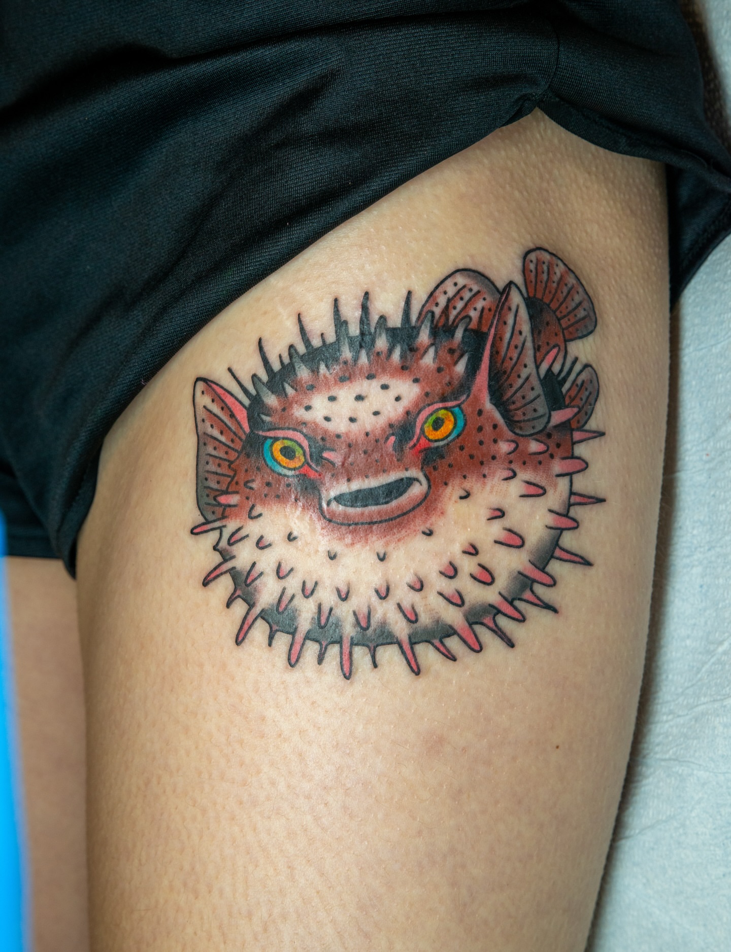 Pufferfish dotwork tattoo on the thigh by Trevor Aarsvold, Minneapolis, Minnesota