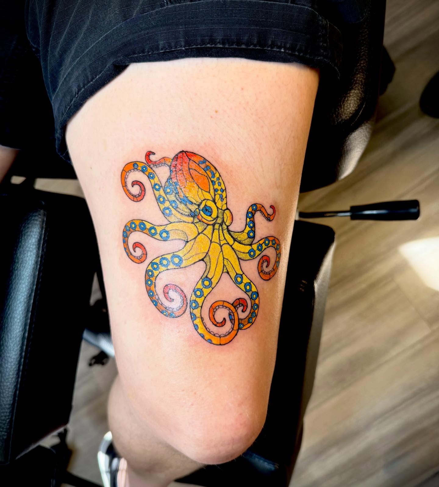 Octopus watercolor tattoo on the thigh by Taytum Marsing, Salt Lake City, Utah