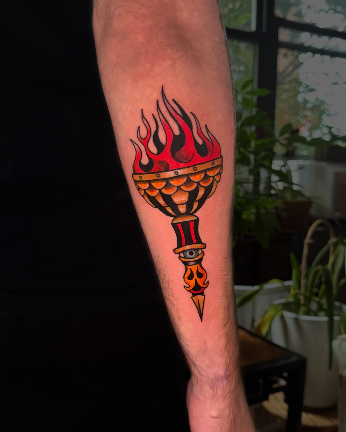 Torch American traditional tattoo on the forearm by marlena borscheid