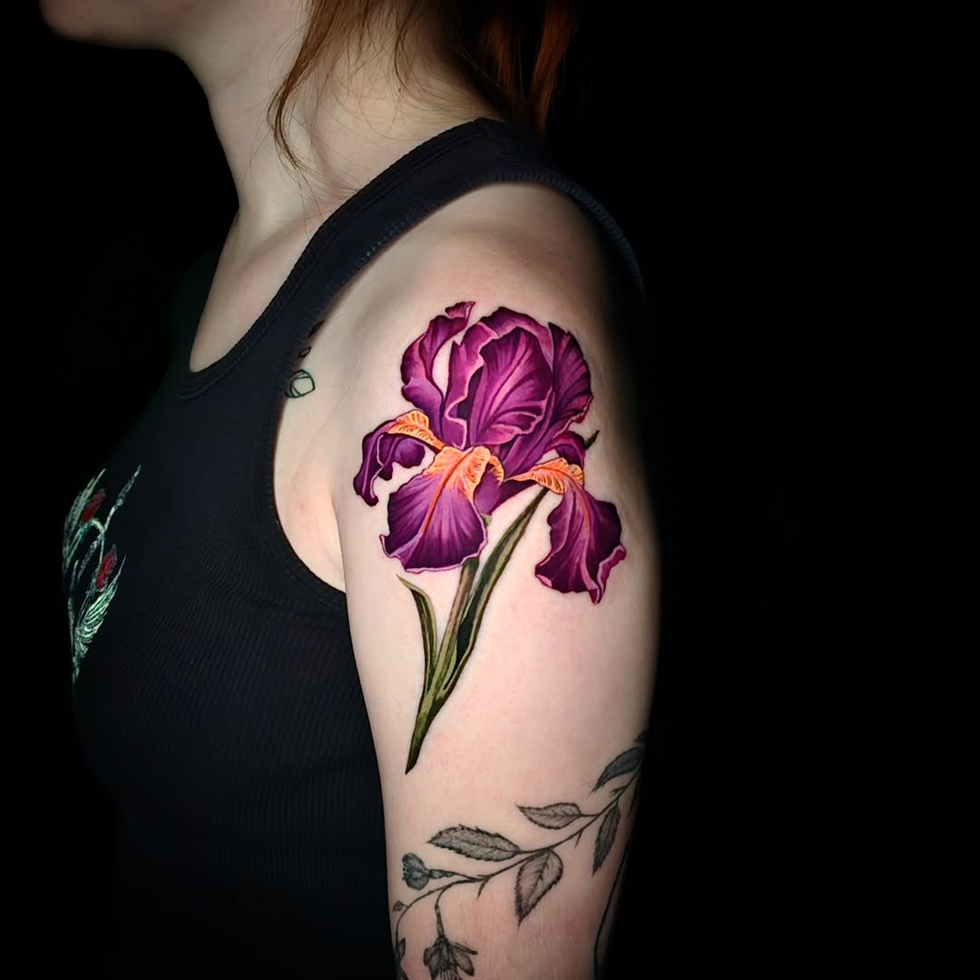 Purple iris flower fine line tattoo on the shoulder by Shar - Utah Tattoo Artist