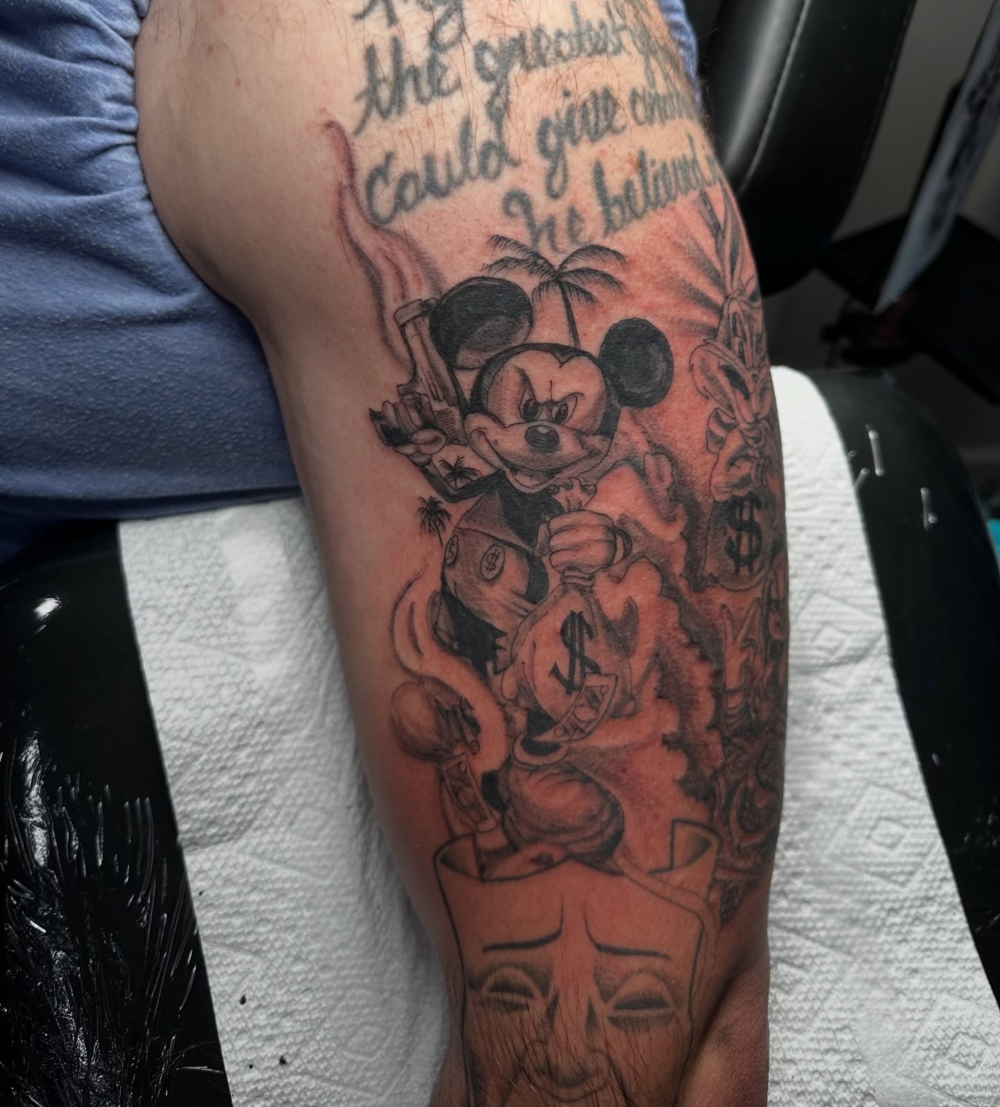 Mickey mouse black and grey tattoo on the forearm by Jinx Ryder