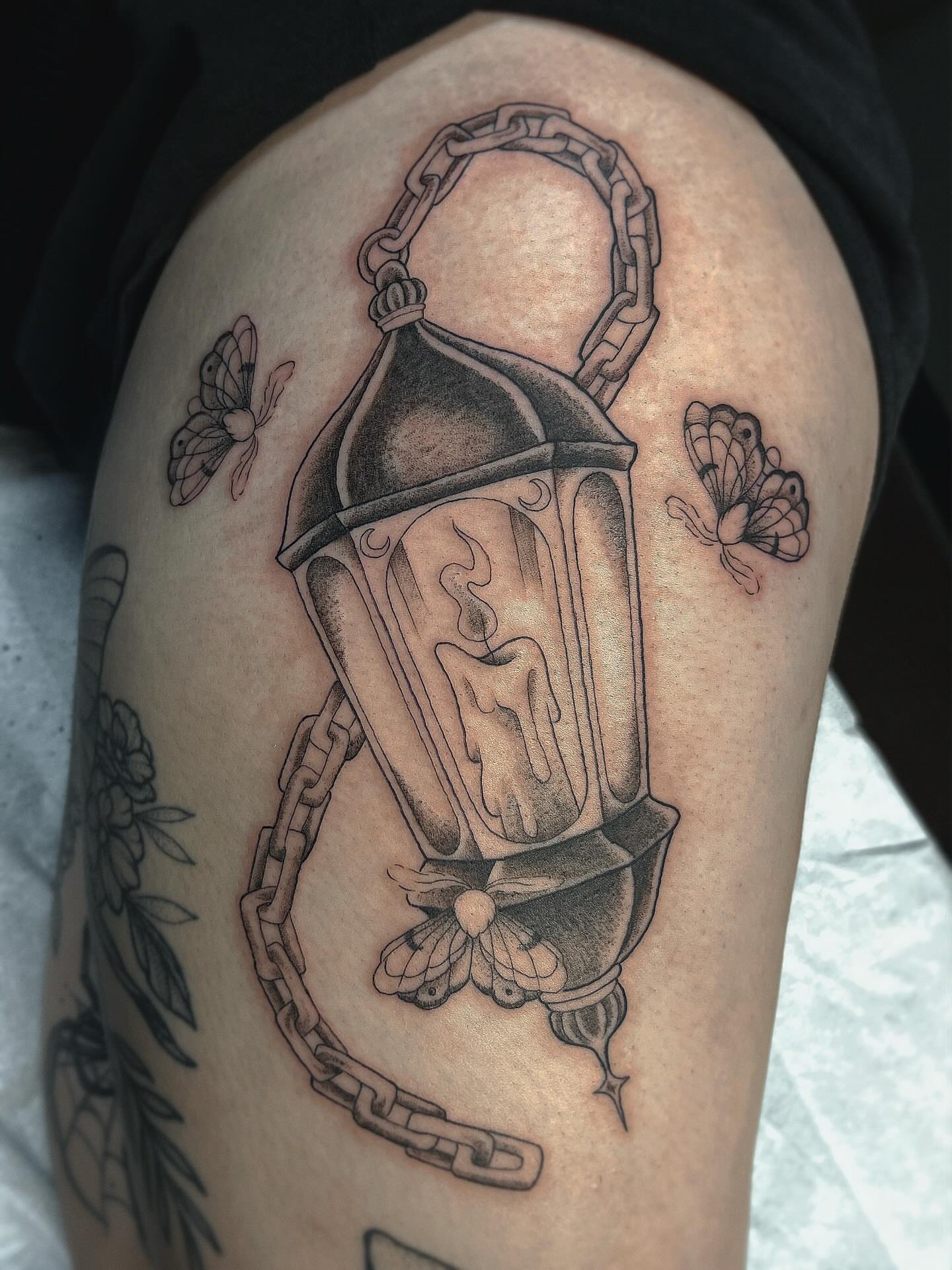 Lantern with candle black and grey tattoo on the thigh by β
πΈππππ β