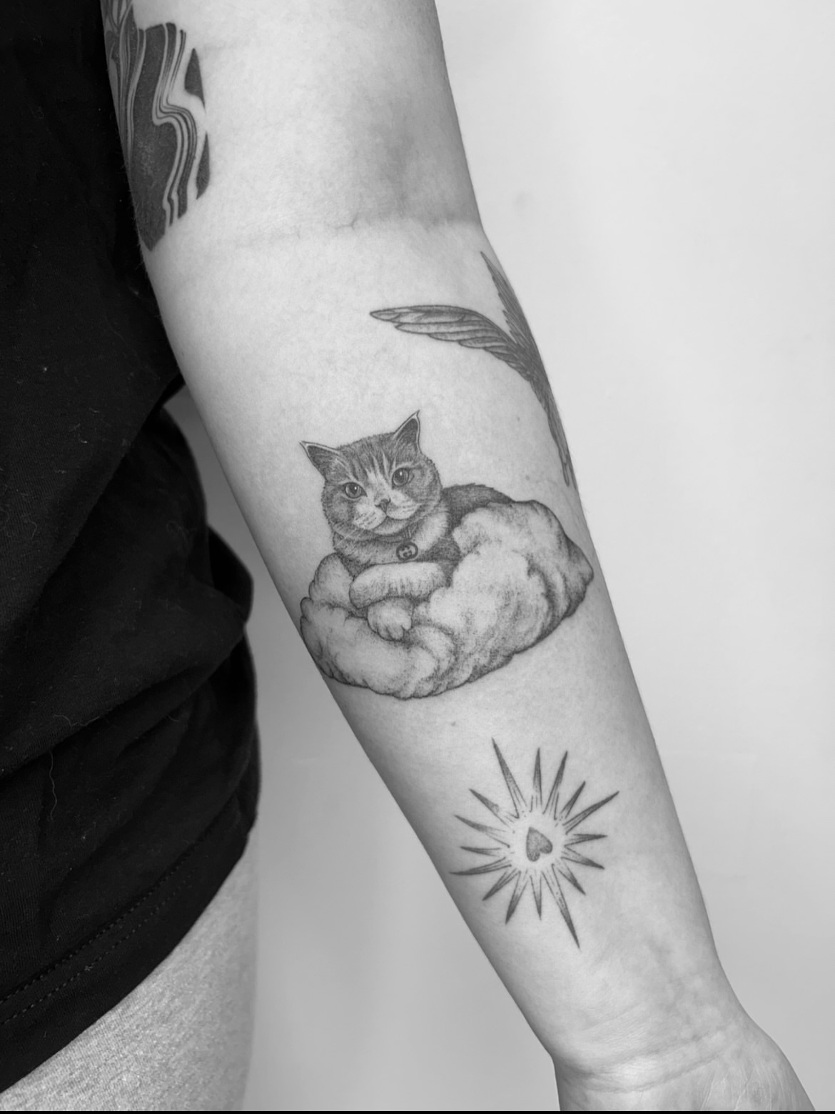 Cat in hands realism tattoo on the forearm by ☆ Nashville Fine Line Tattoo Artist ☆