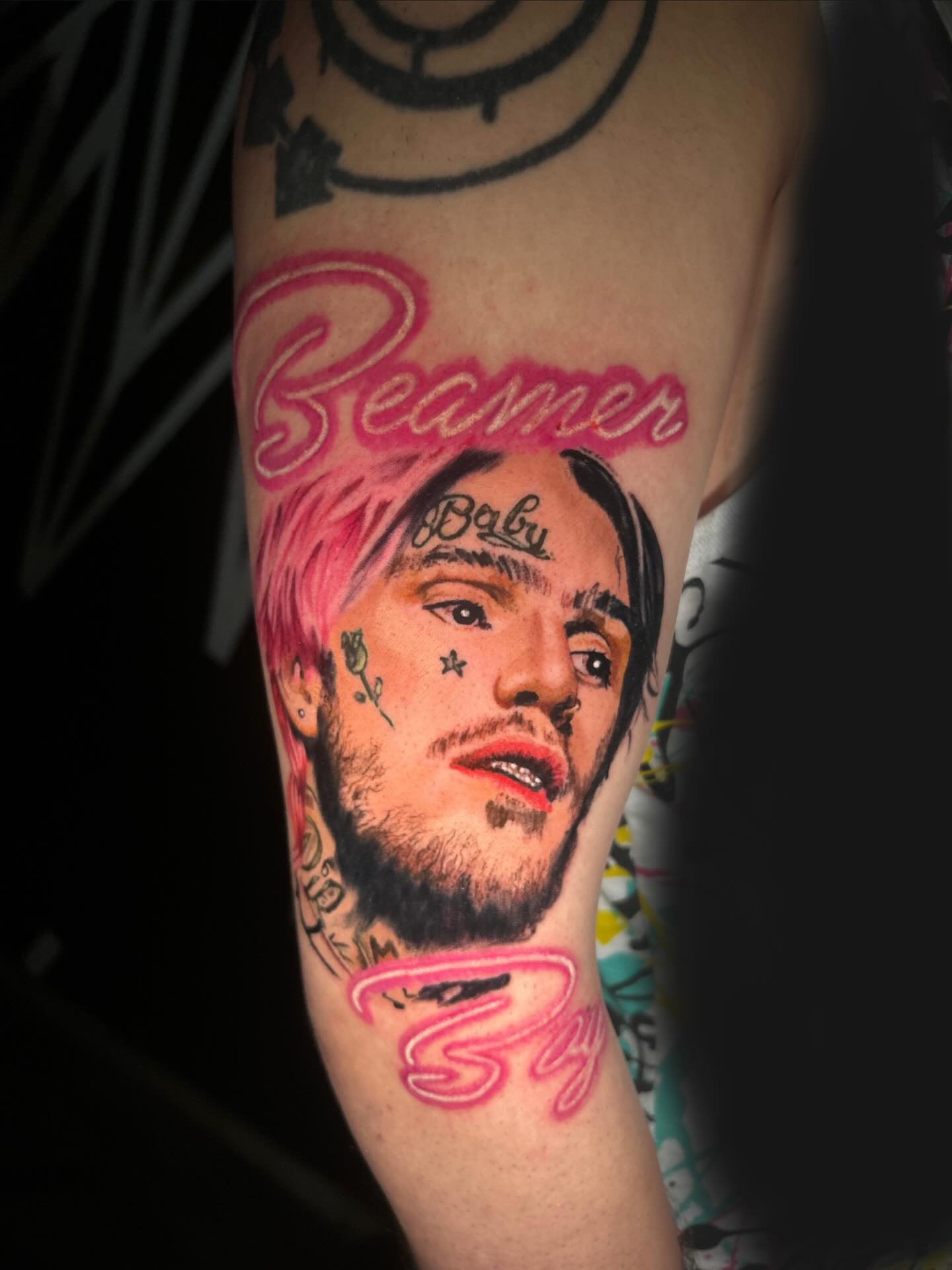 Portrait realism tattoo on the forearm by Sean Cavanaugh
