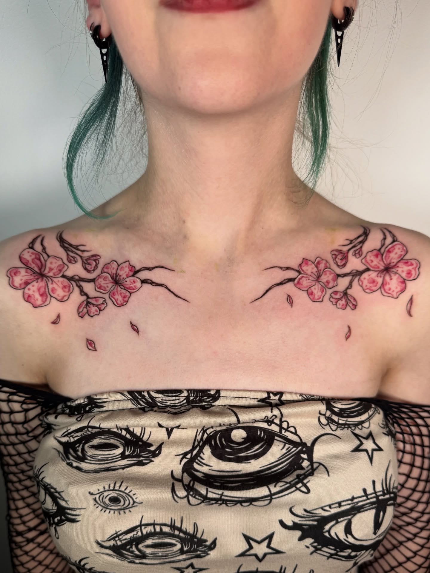 Cherry blossoms dotwork tattoo on the chest by Diana