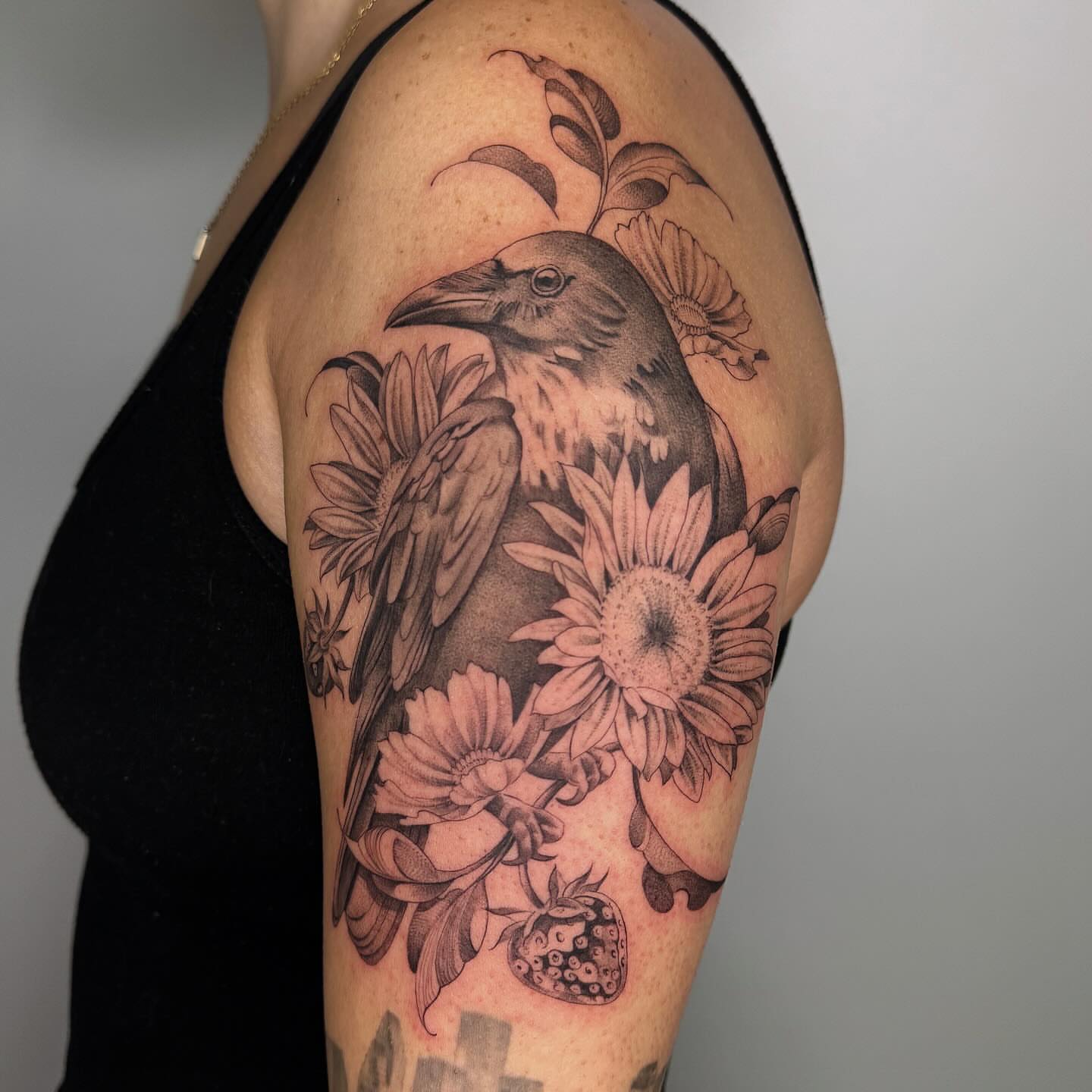 Bird and sunflowers realism tattoo on the shoulder by Alyssa . Villela