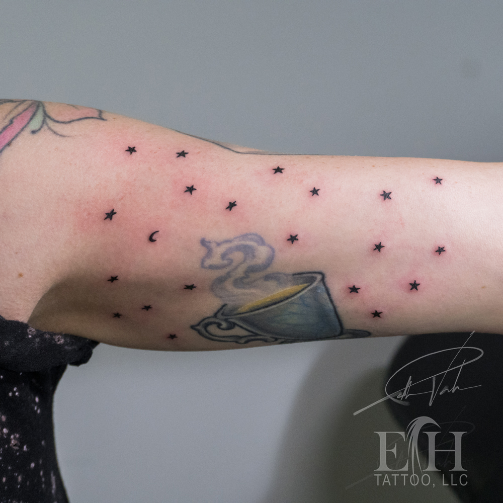 Teacup and stars dotwork tattoo on the forearm by Donald Voelker