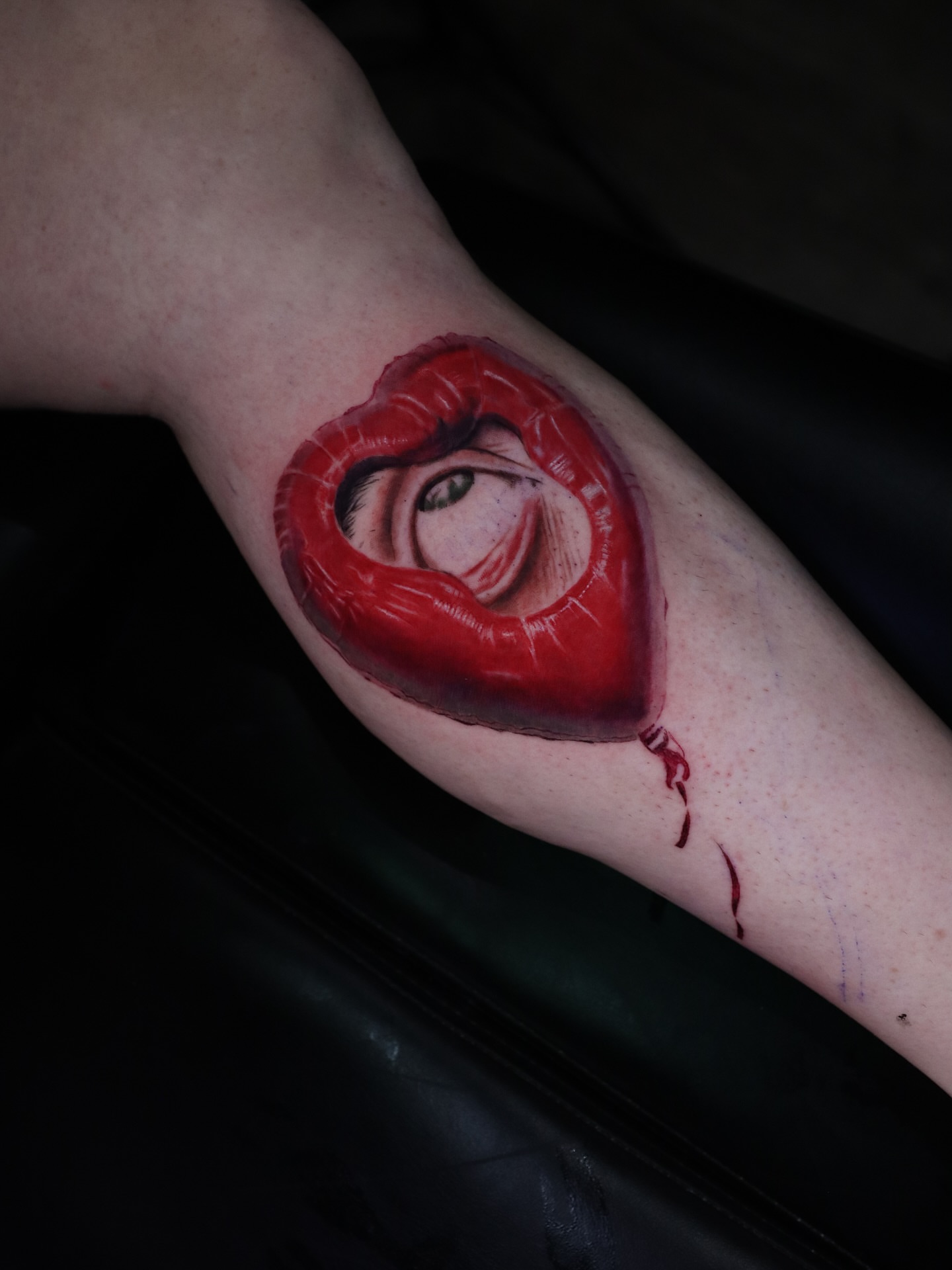 Heart with eye realism tattoo on the forearm by Naomi Burke, New Westminster, British Columbia