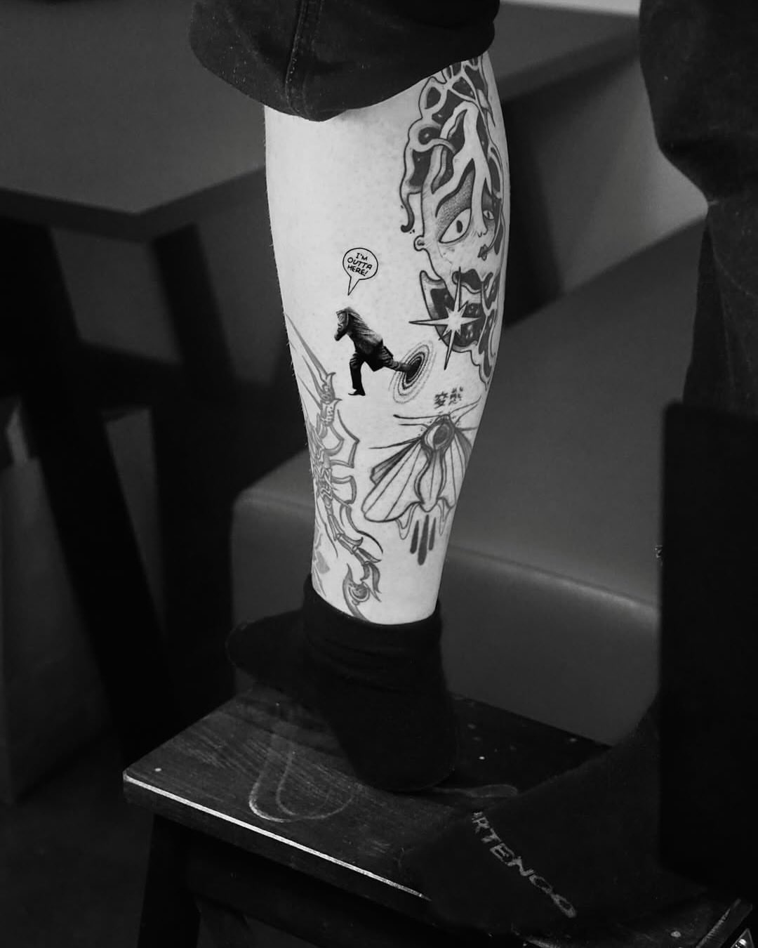 Abstract surrealism surrealism tattoo on the calf by Metin Karaatli