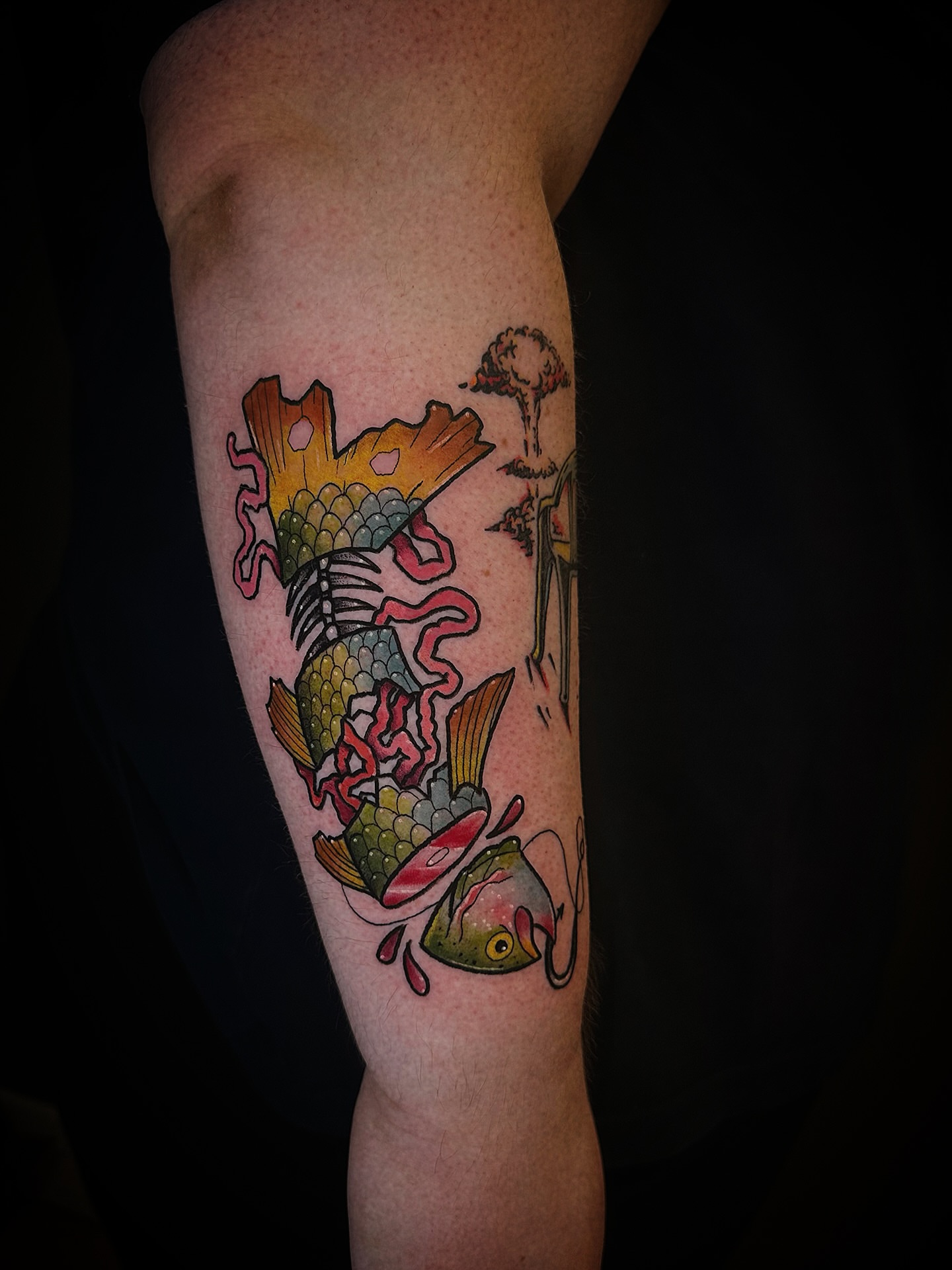 Fish skeleton American traditional tattoo on the forearm by E L I Z A H B e T H H D e S I G N S