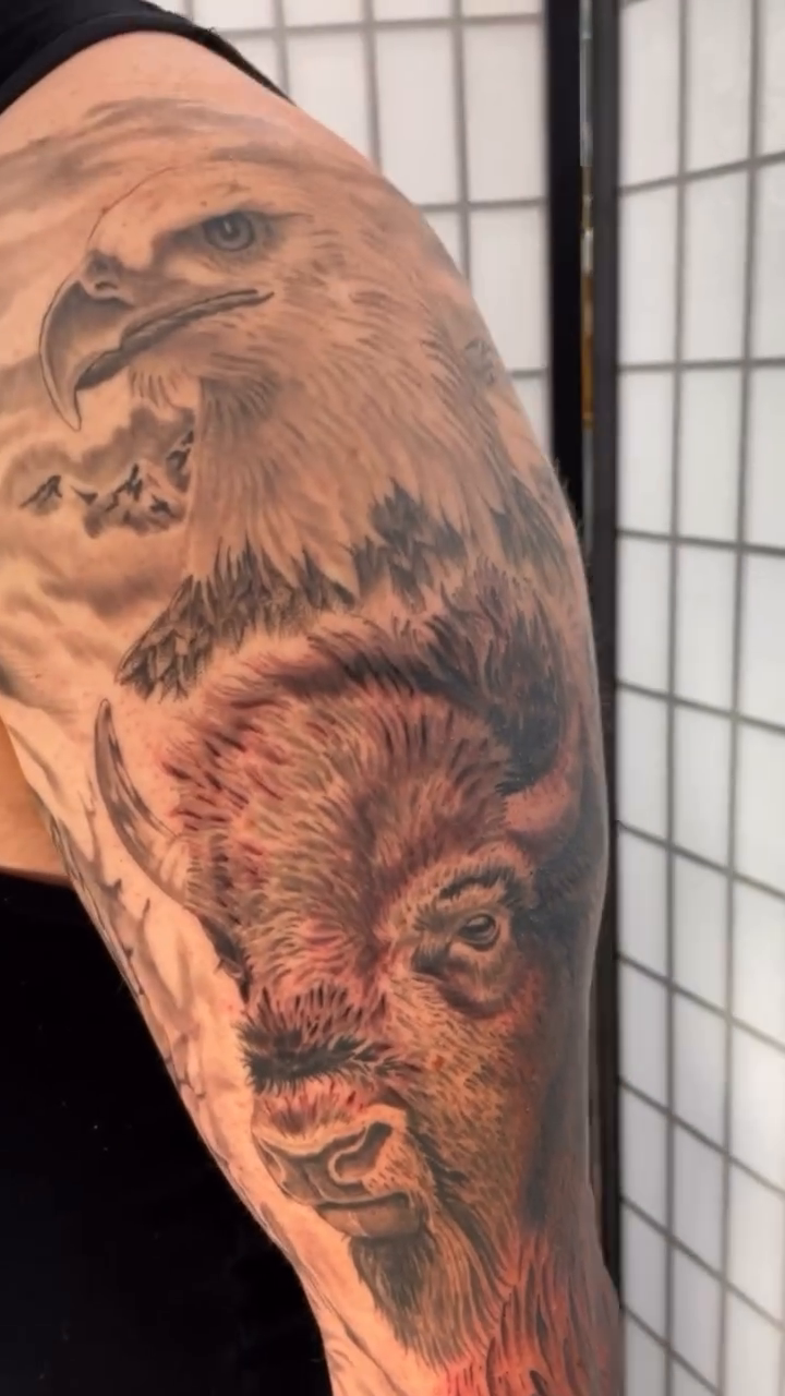 Tattoo by @calebbakertattoo — realism, black_and_grey