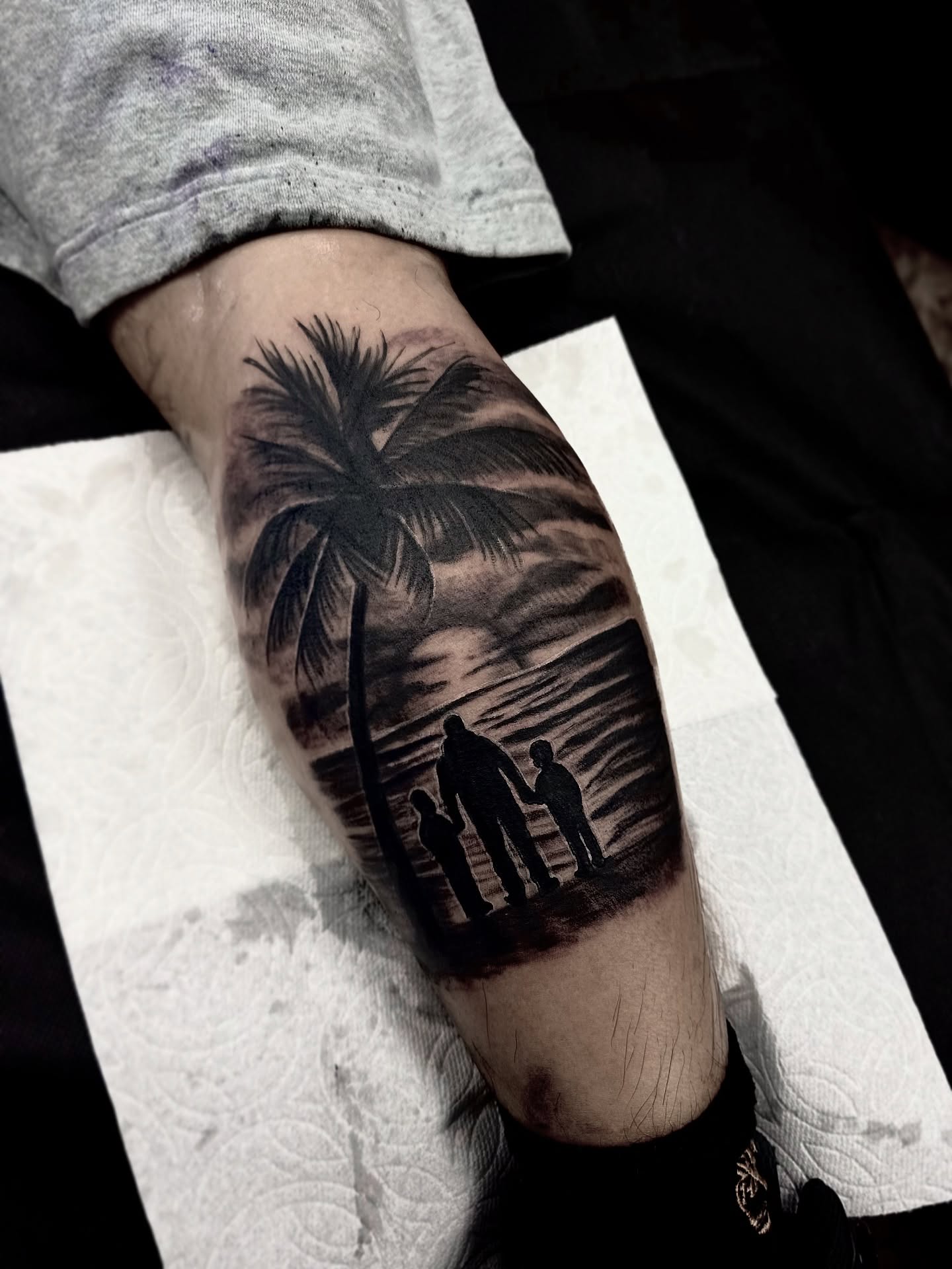 Family silhouette realism tattoo on the forearm by ♟️SouthEastLA♟️