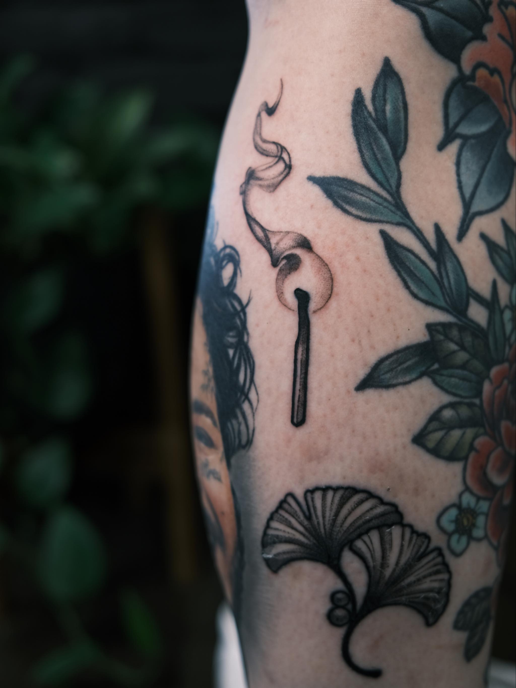 Smoking candle black and grey tattoo on the forearm by Ben Cisek