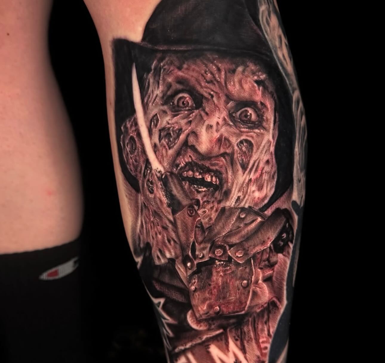 Freddy Krueger realism tattoo on the forearm by Sideshow Danny