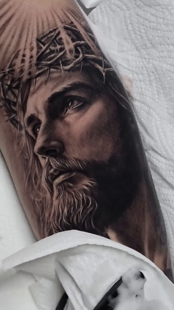 Jesus Christ portrait realism tattoo by Cipri Suciu