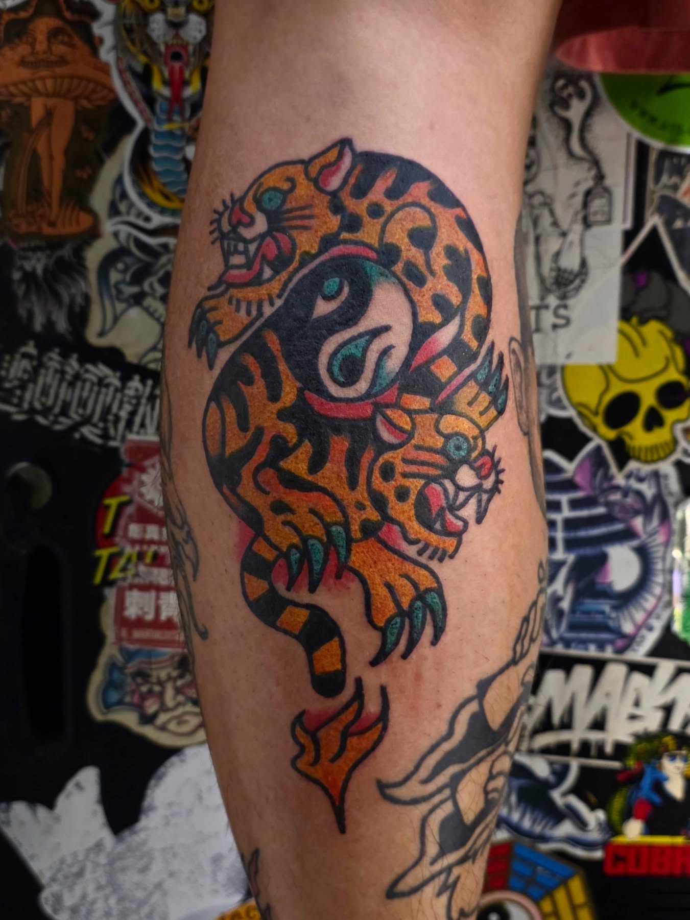 Jaguar American traditional tattoo on the forearm by Mitch Braver