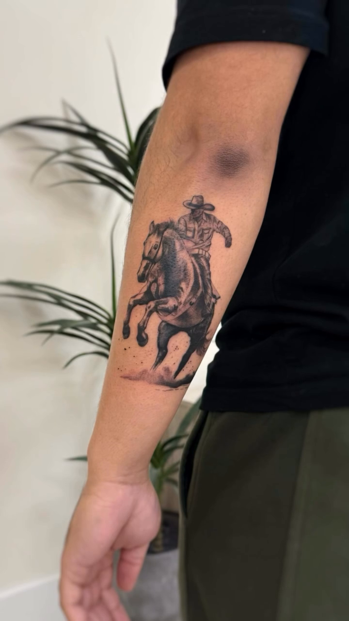 Cowboy on a horse realism tattoo by David