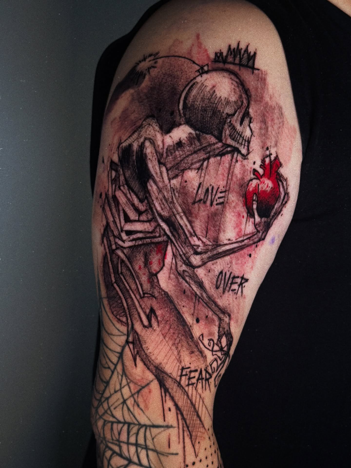 Love overcoming fear dark realism tattoo on the shoulder by Georgios Papadopoulos Tattoo Artist Los