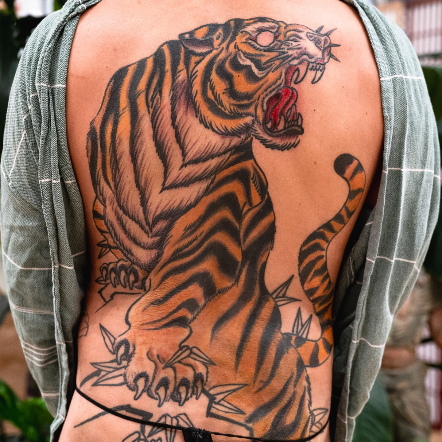Tiger American traditional tattoo on the back by James Fernella, San Francisco, California