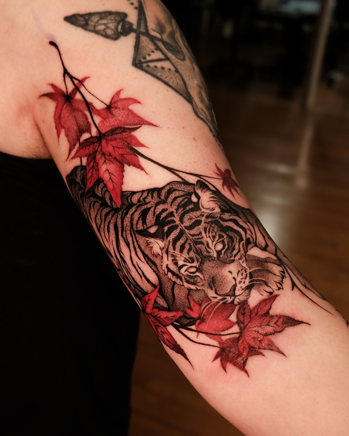 Tiger and maple leaves japanese irezumi tattoo on the forearm by Ohio Tattoo Artist - Tehya Maxwell, Springfield, Ohio