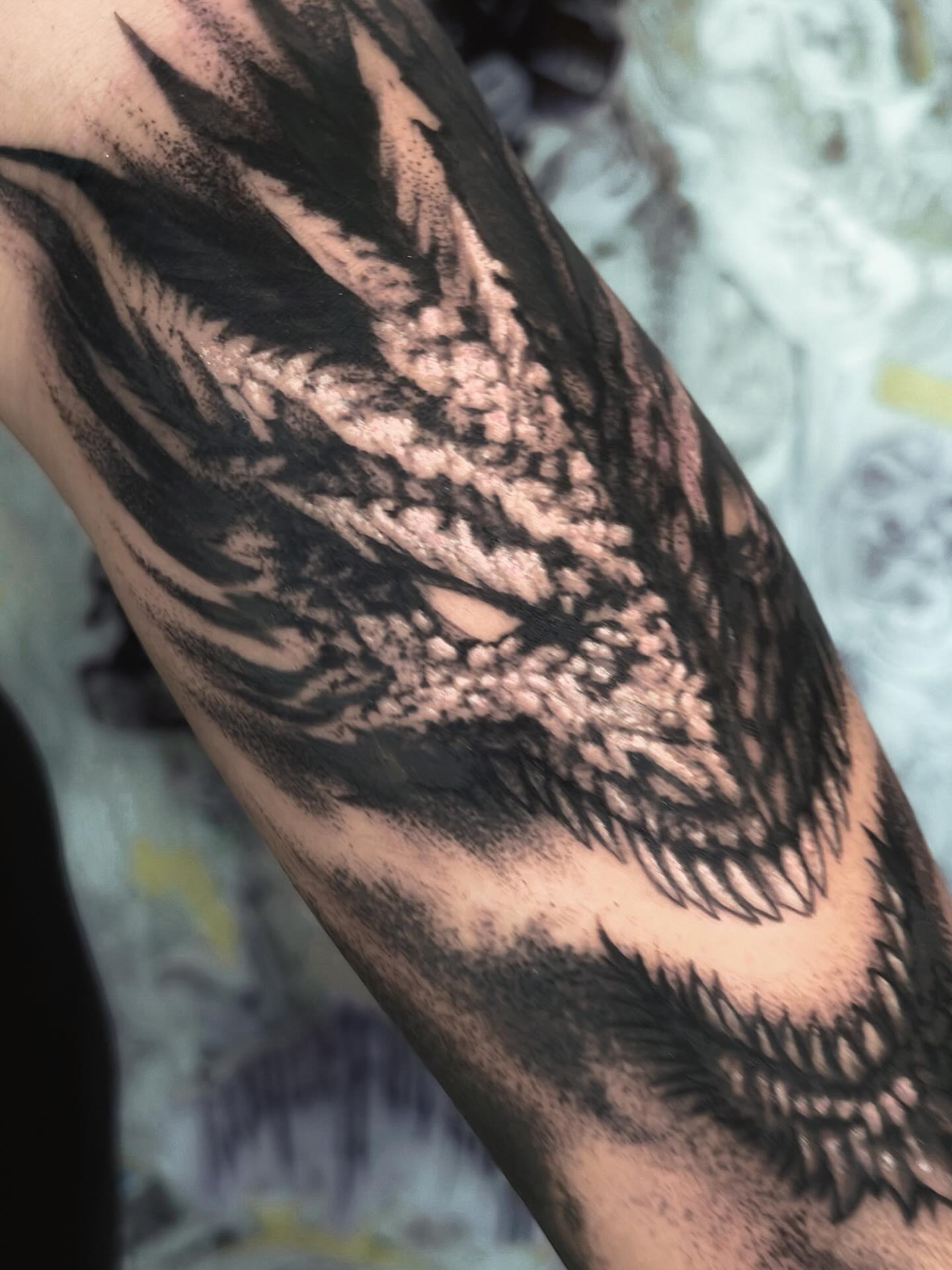 Dragon realism tattoo on the forearm by Italo Holie