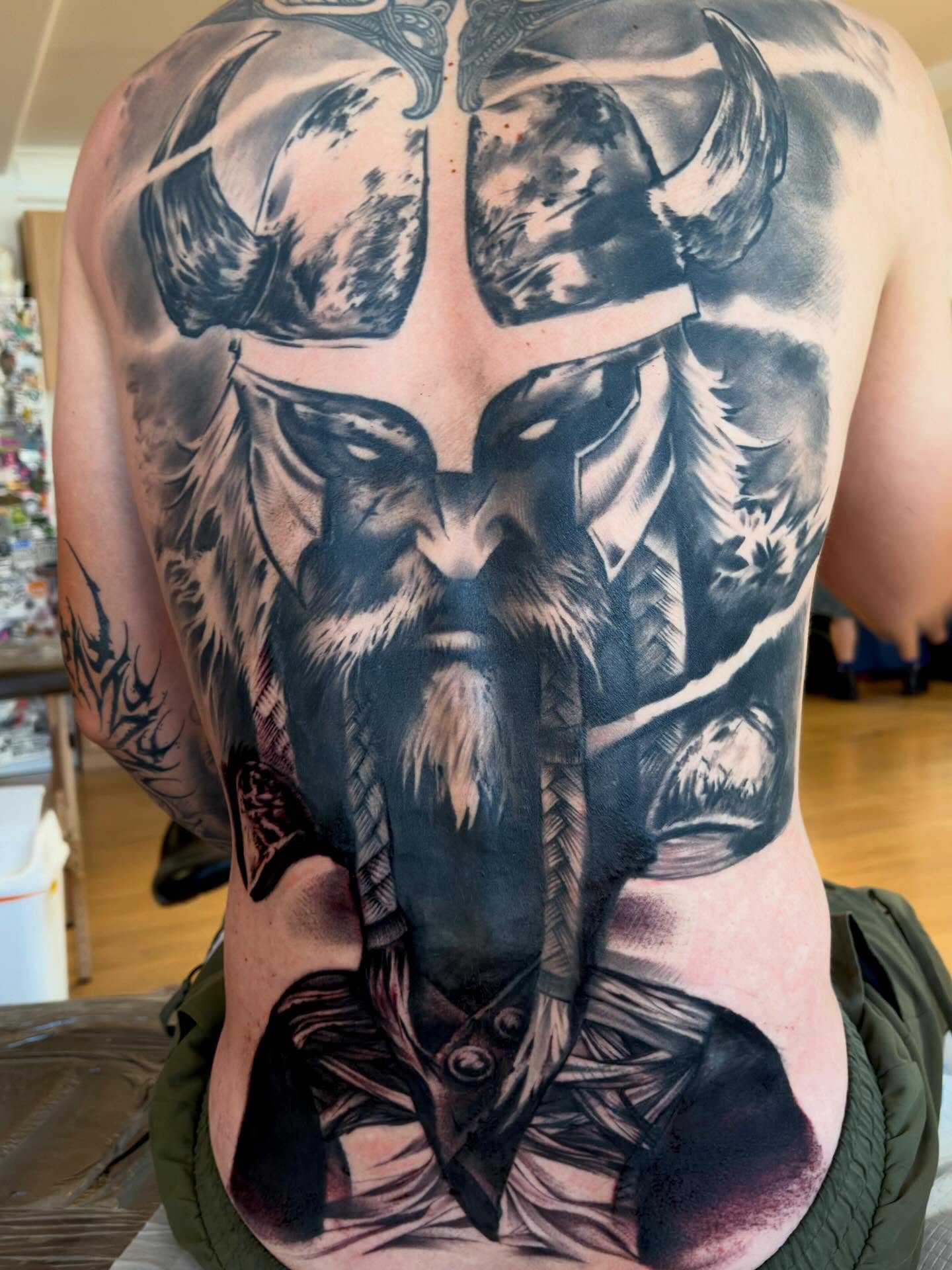 Viking warrior realism tattoo on the back by Italo Holie