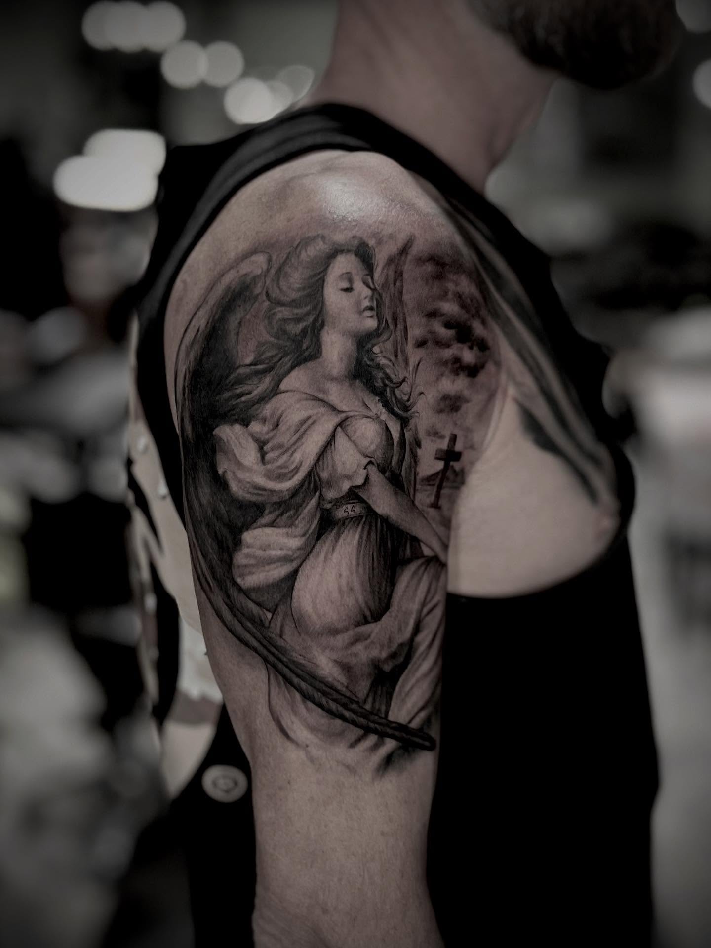 Angel realism tattoo on the forearm by Mike j tattooer