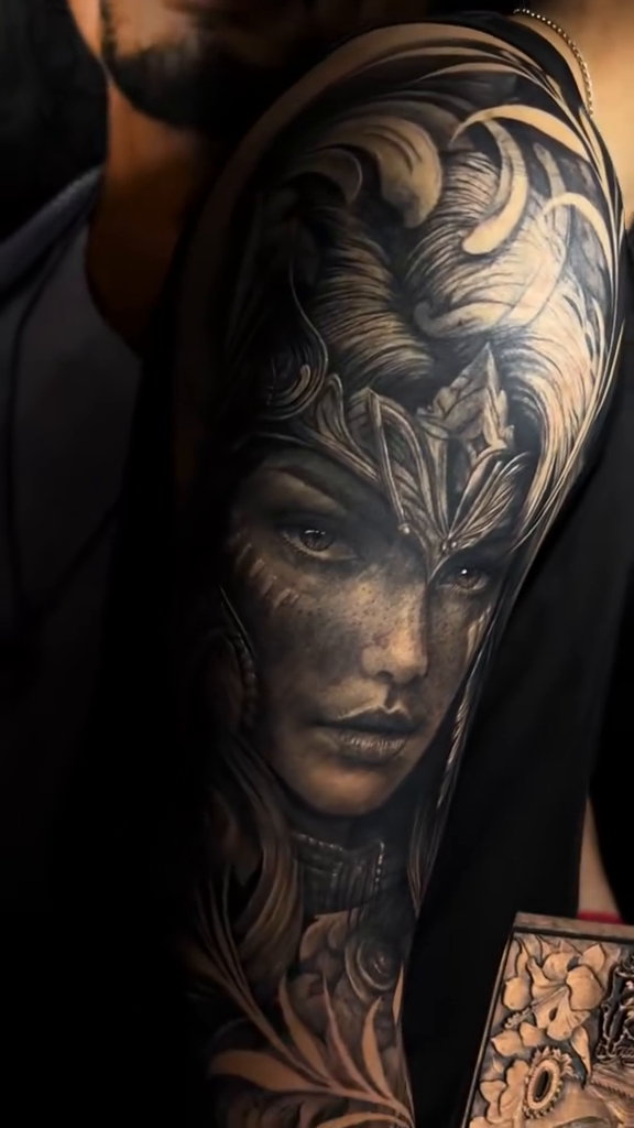 Tattoo by @elmertattoo1 — realism, black_and_grey