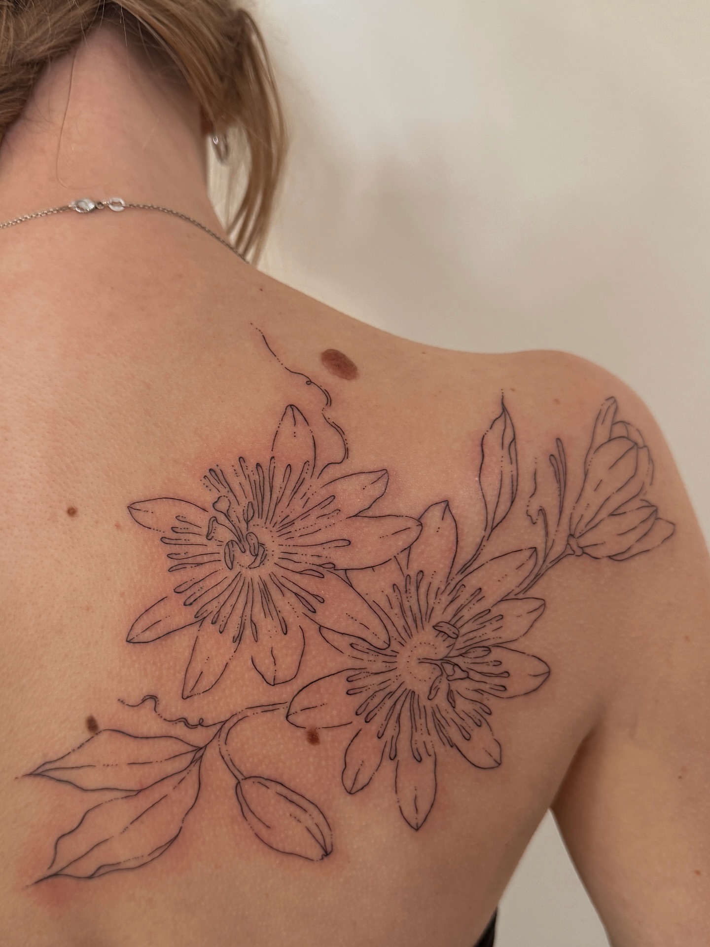 Flowers black and grey tattoo on the shoulder by Inky Apricot, Austin, Texas