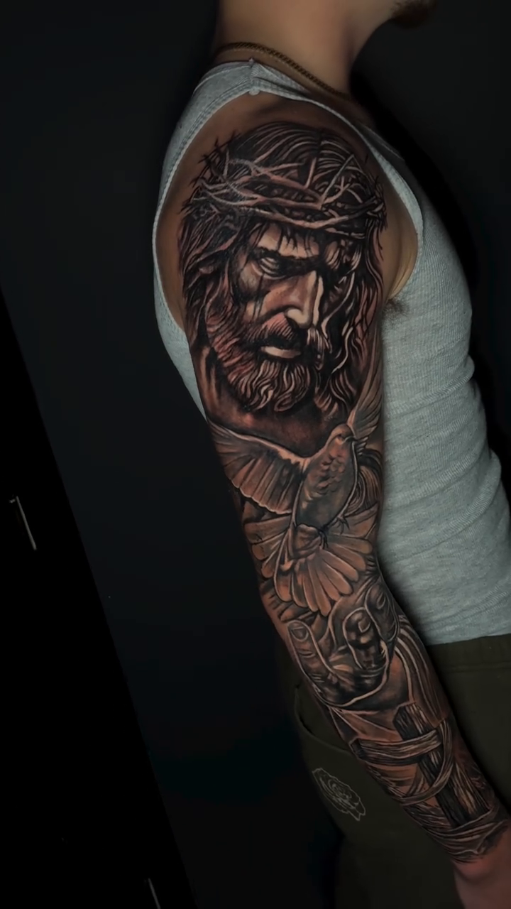 Jesus Christ with doves realism tattoo by Paul burrows (Tatttoo Artist)