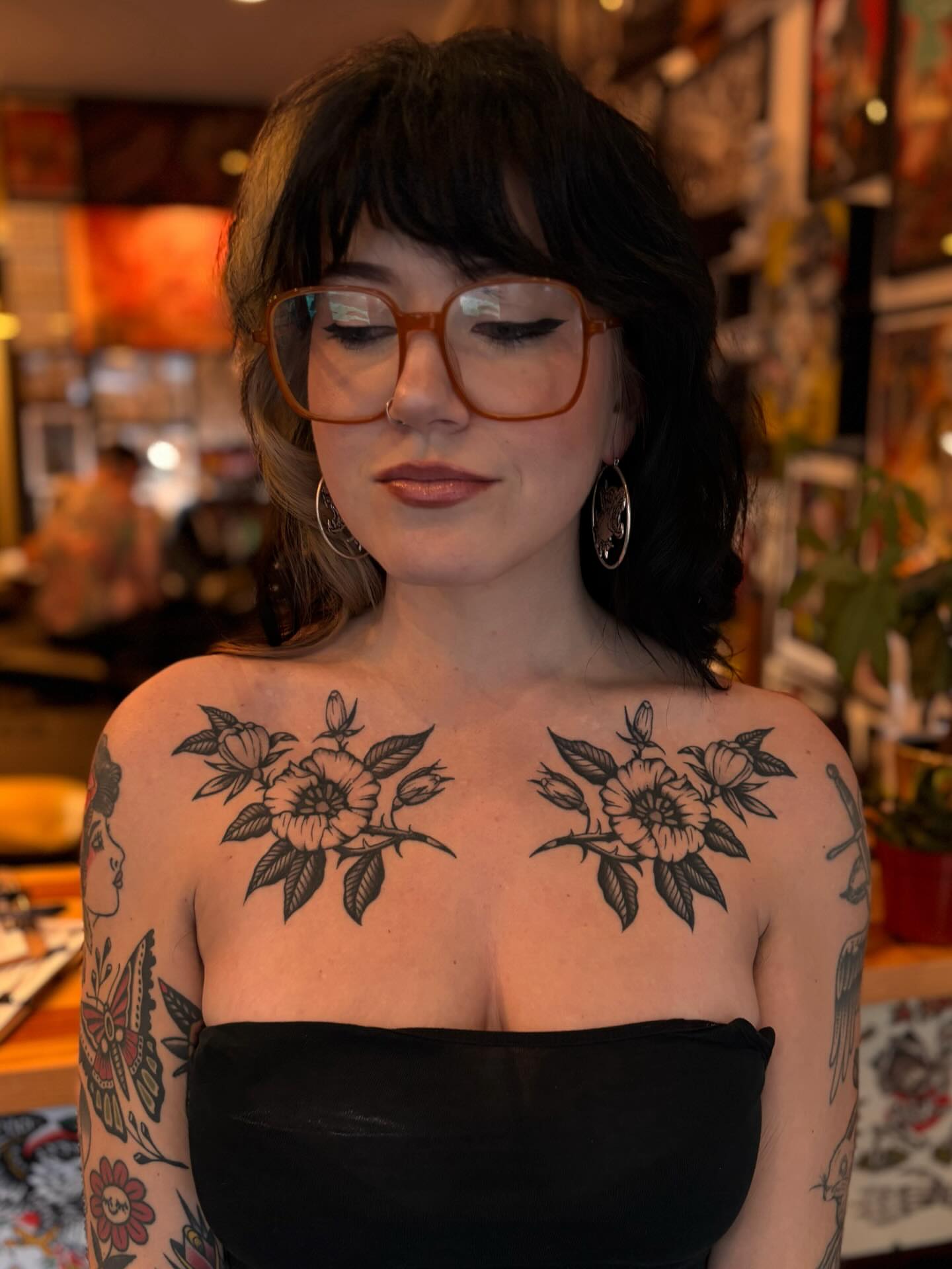Floral bouquet American traditional tattoo on the chest by Jesse Smith, Chicago, Illinois