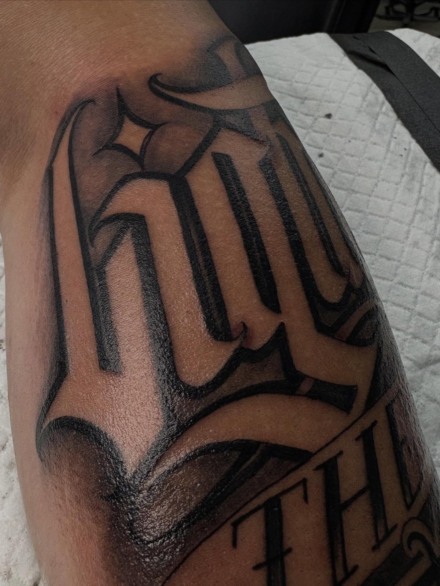 Lettering lettering script tattoo on the forearm by Trusty Dizon Tattoo Artist