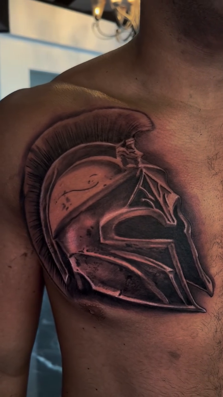 Spartan helmet realism tattoo by Danny Aceves ✨ San Diego tattoo artist