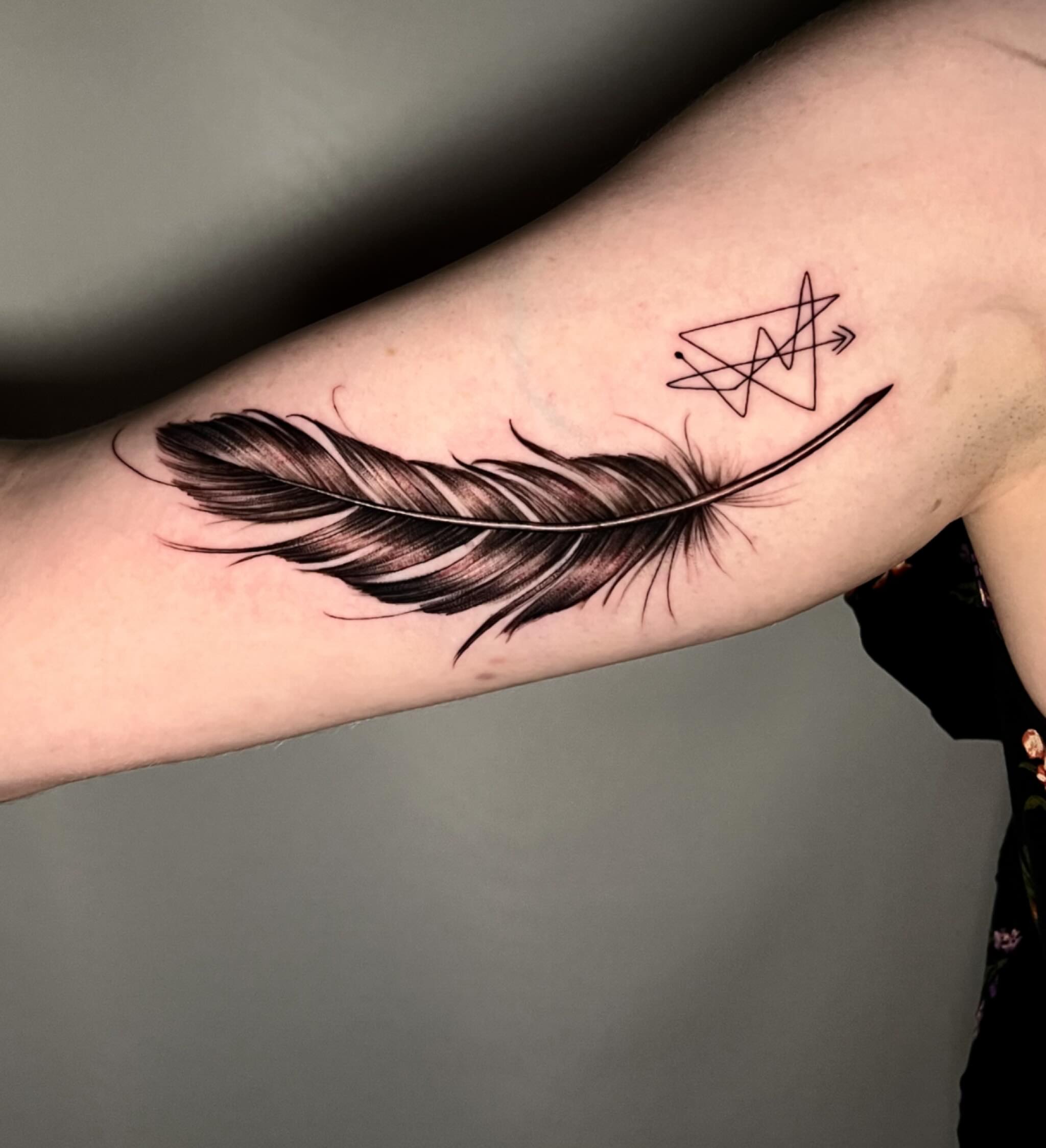 Feather realism tattoo on the forearm by Joi Bailey, Denton, Texas