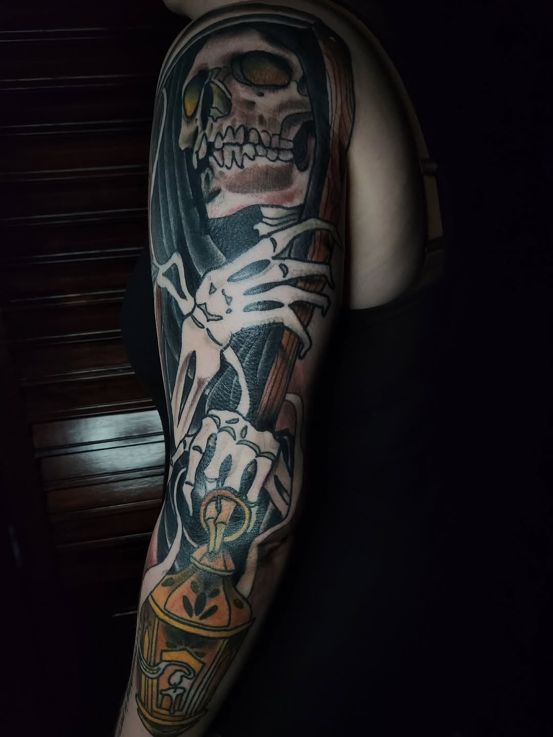 Skeleton with perfume bottle American traditional tattoo on the forearm by Ben Friday, Phoenix, Arizona