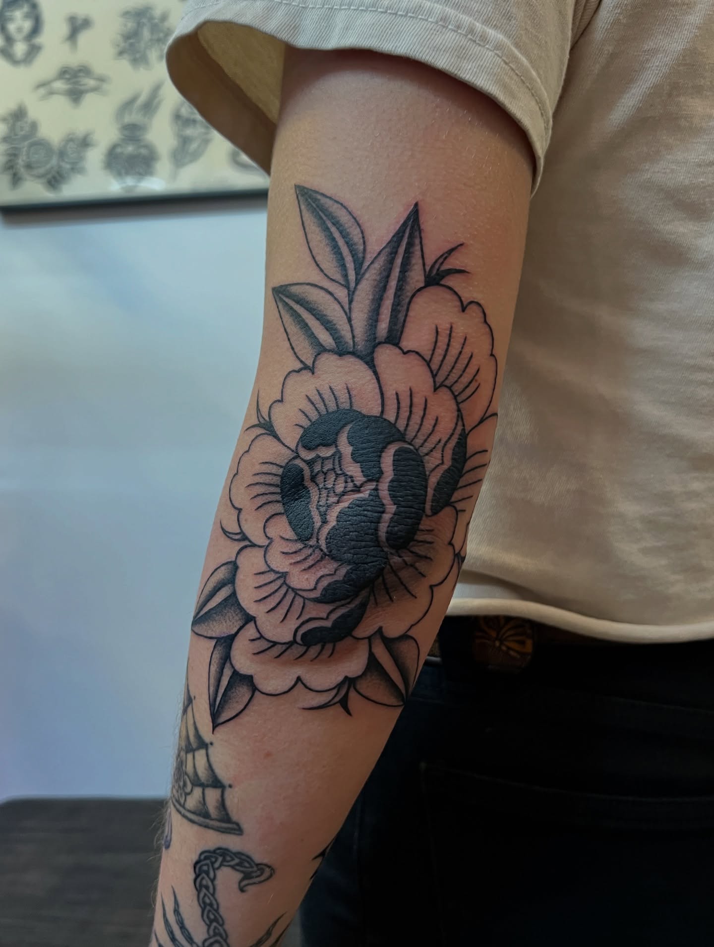 Peony black and grey tattoo on the forearm by @syrenbier, San Francisco, California