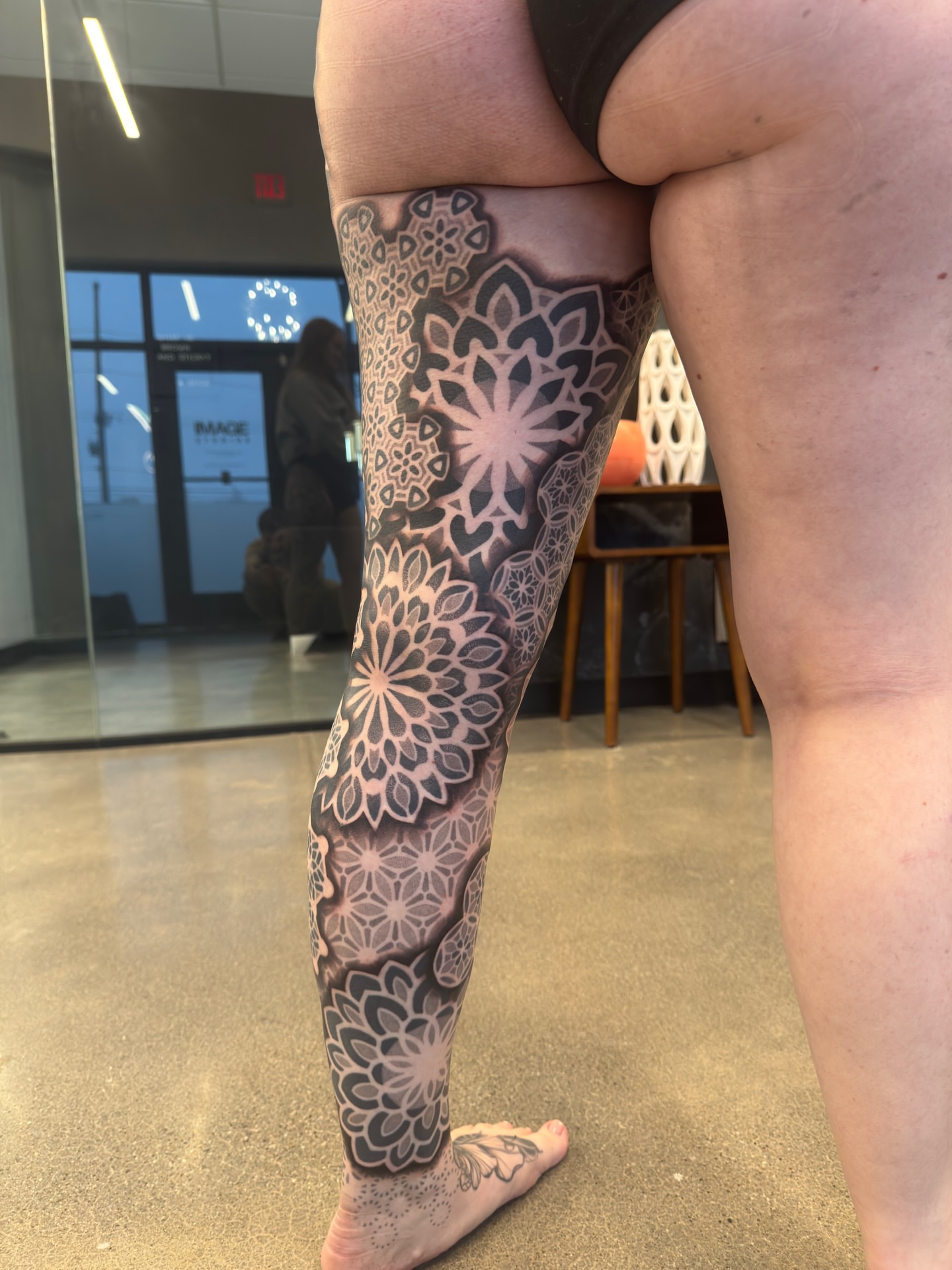 Geometric mandala geometric tattoo on the leg by Christofer Irvin