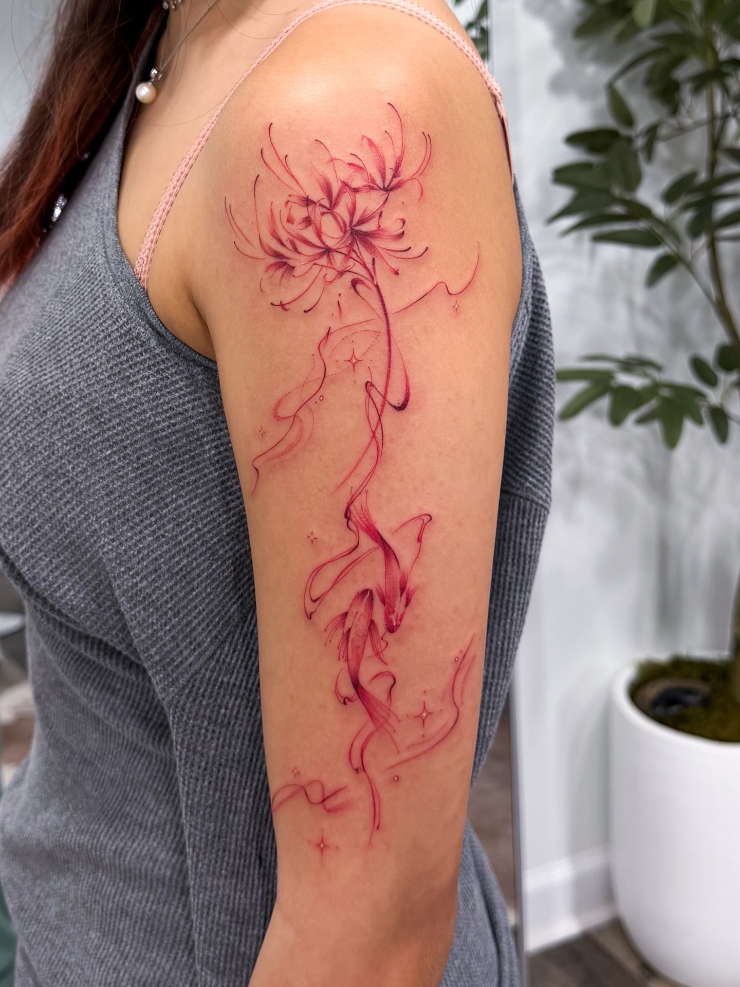 Chrysanthemum dotwork tattoo on the forearm by Adriano Bassalo