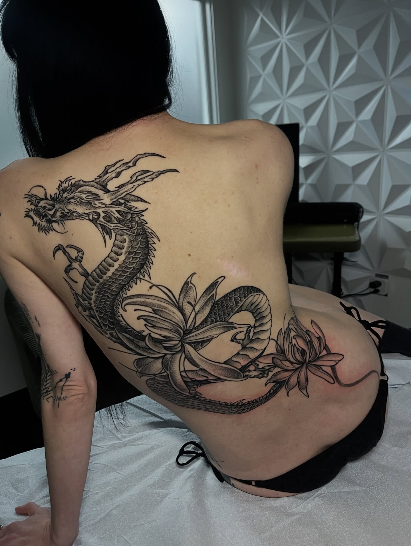 Dragon and lotus realism tattoo on the back by Brittany Welsh, Marlton, New Jersey