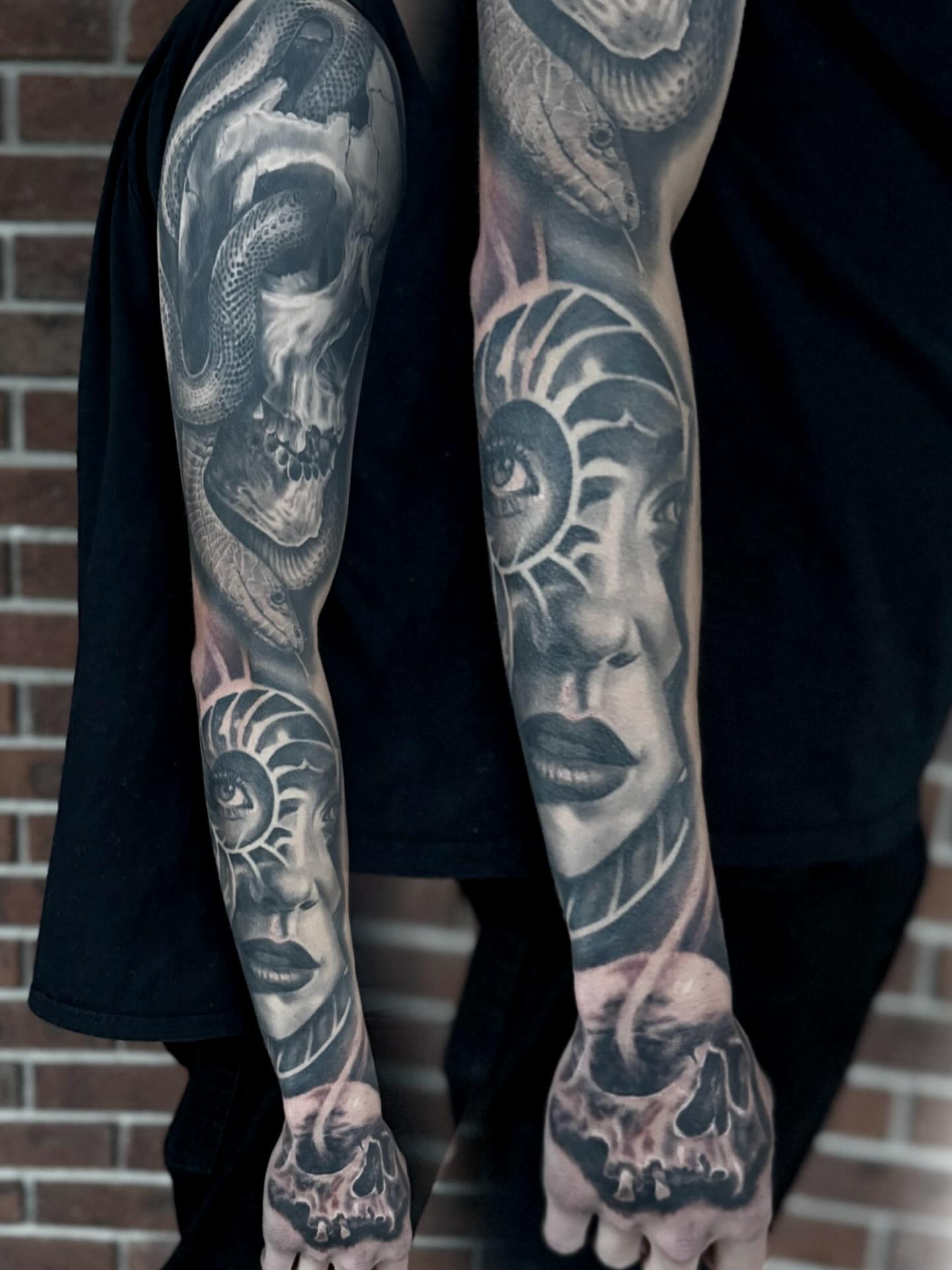 Woman's face realism tattoo on the forearm by Jeremiah Warner