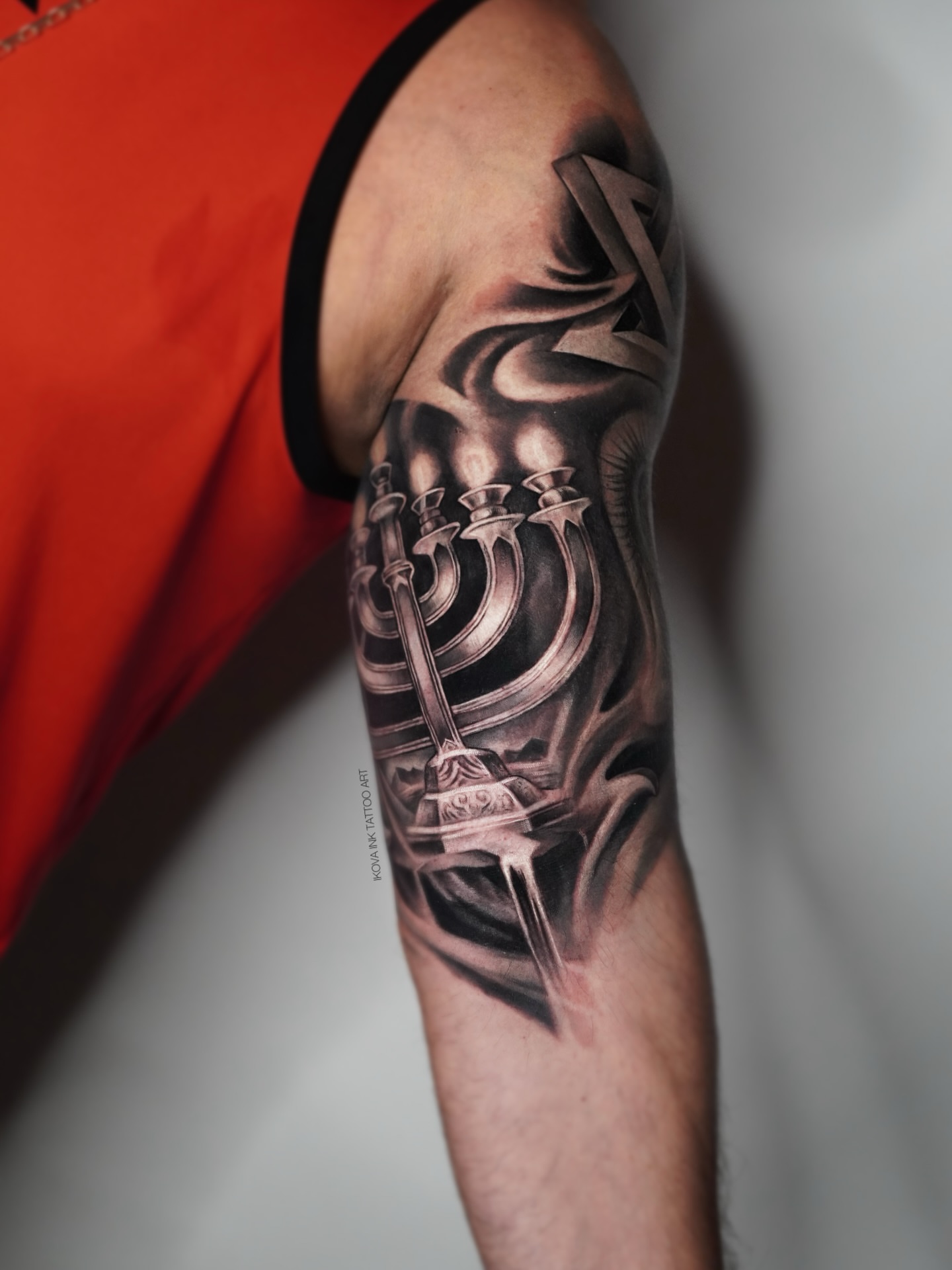 Menorah realism tattoo on the forearm by Tattoo Artist Miami & la, Hollywood, Florida