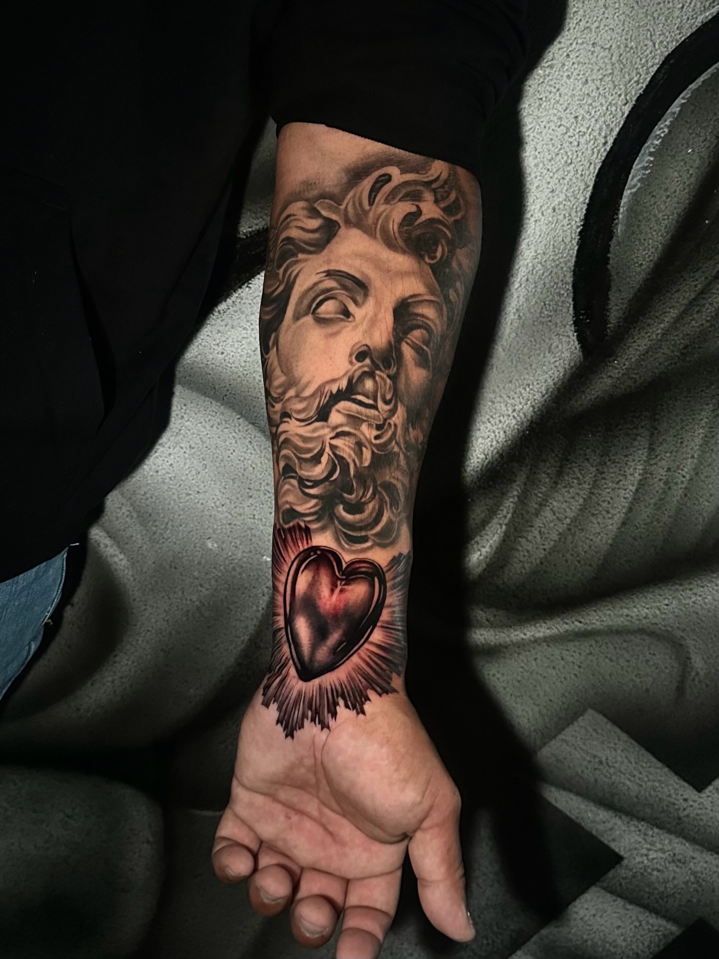 Bearded man's head realism tattoo on the forearm by Emma Sferdian🇷🇴